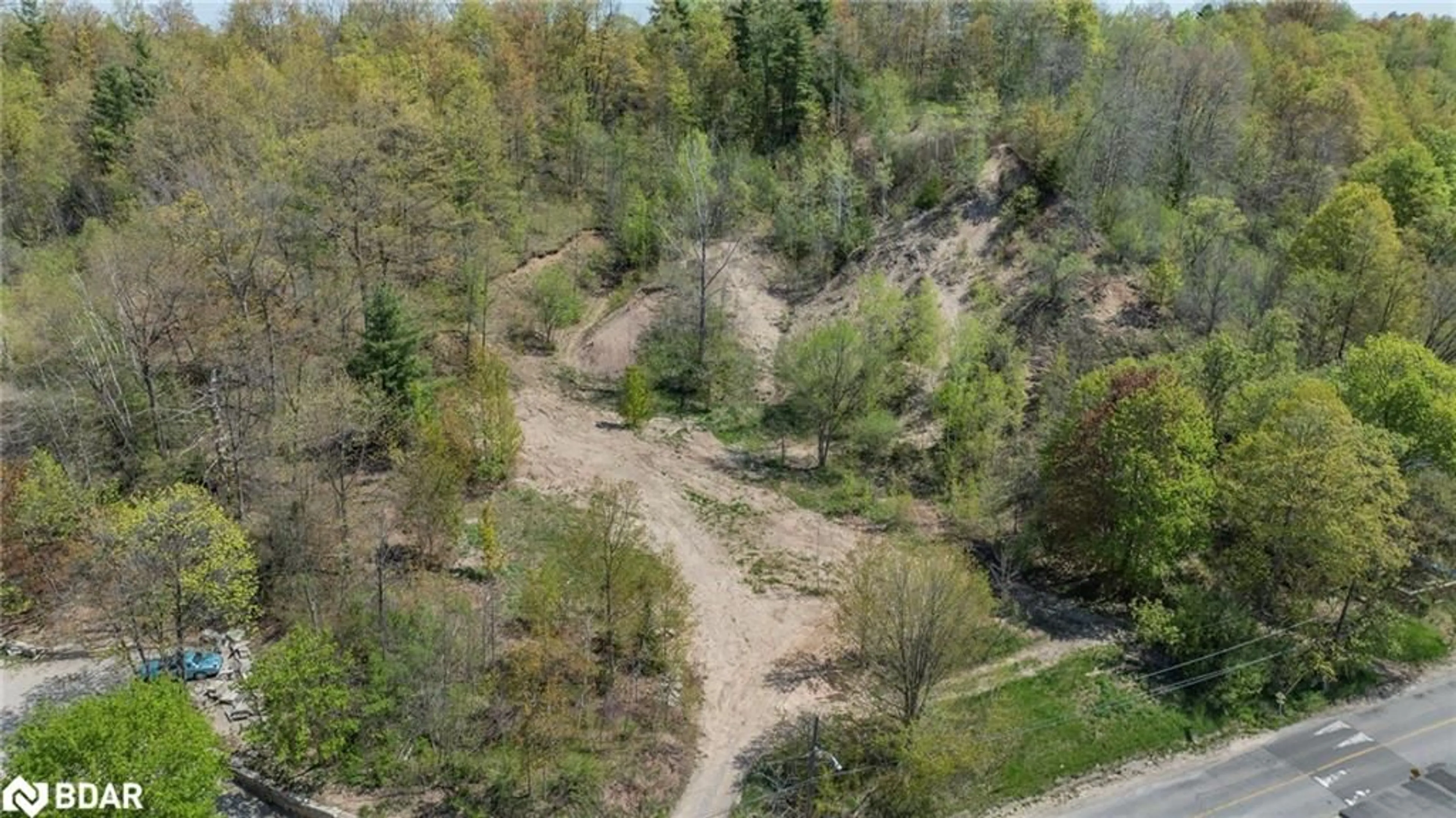 A pic from outside/outdoor area/front of a property/back of a property/a pic from drone, forest/trees view for 22 Main St St, Glen Williams Ontario L7G 3G8