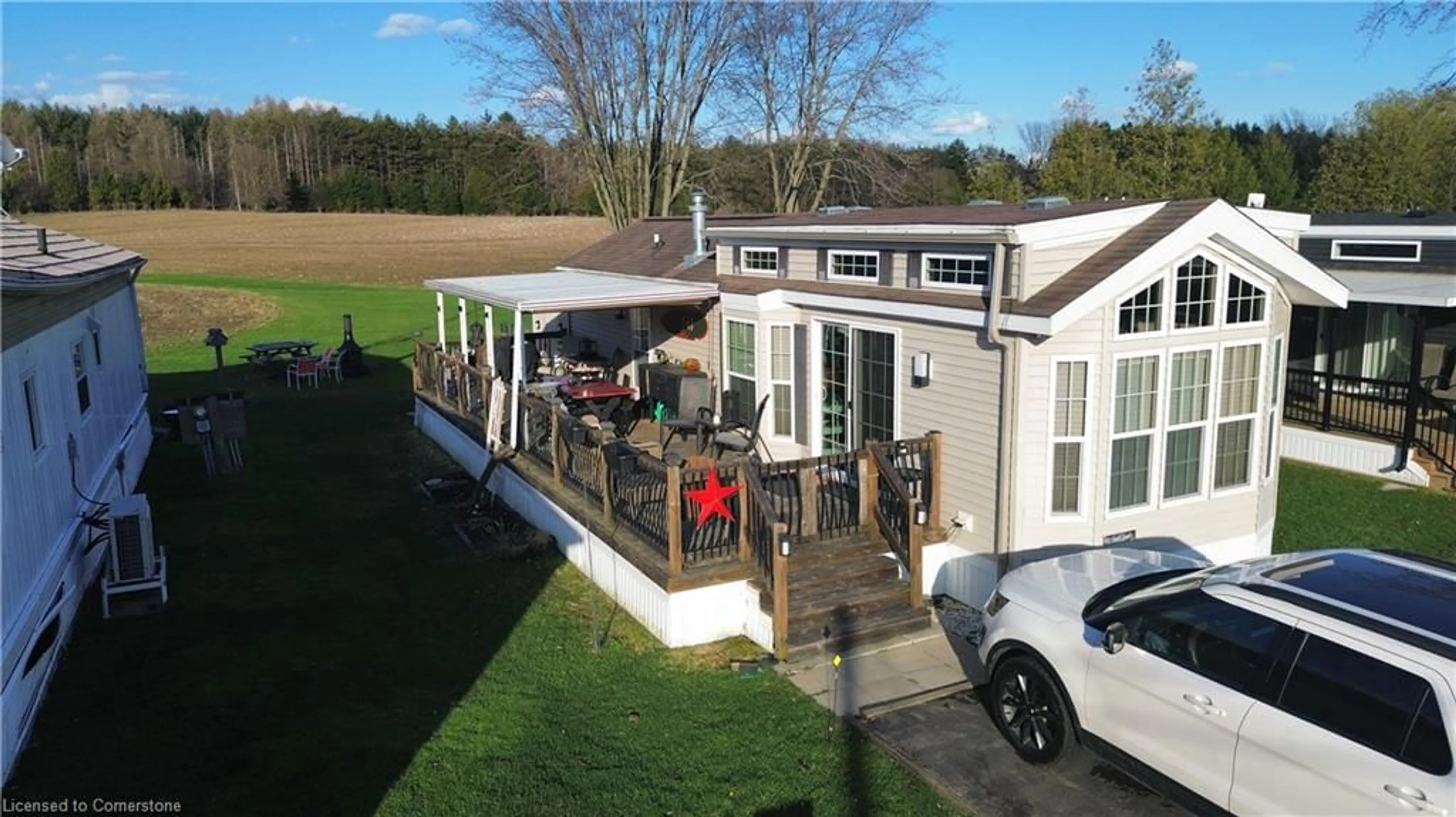 A pic from outside/outdoor area/front of a property/back of a property/a pic from drone, unknown for 580 Beaver Creek Rd #249, Waterloo Ontario N2J 3Z4