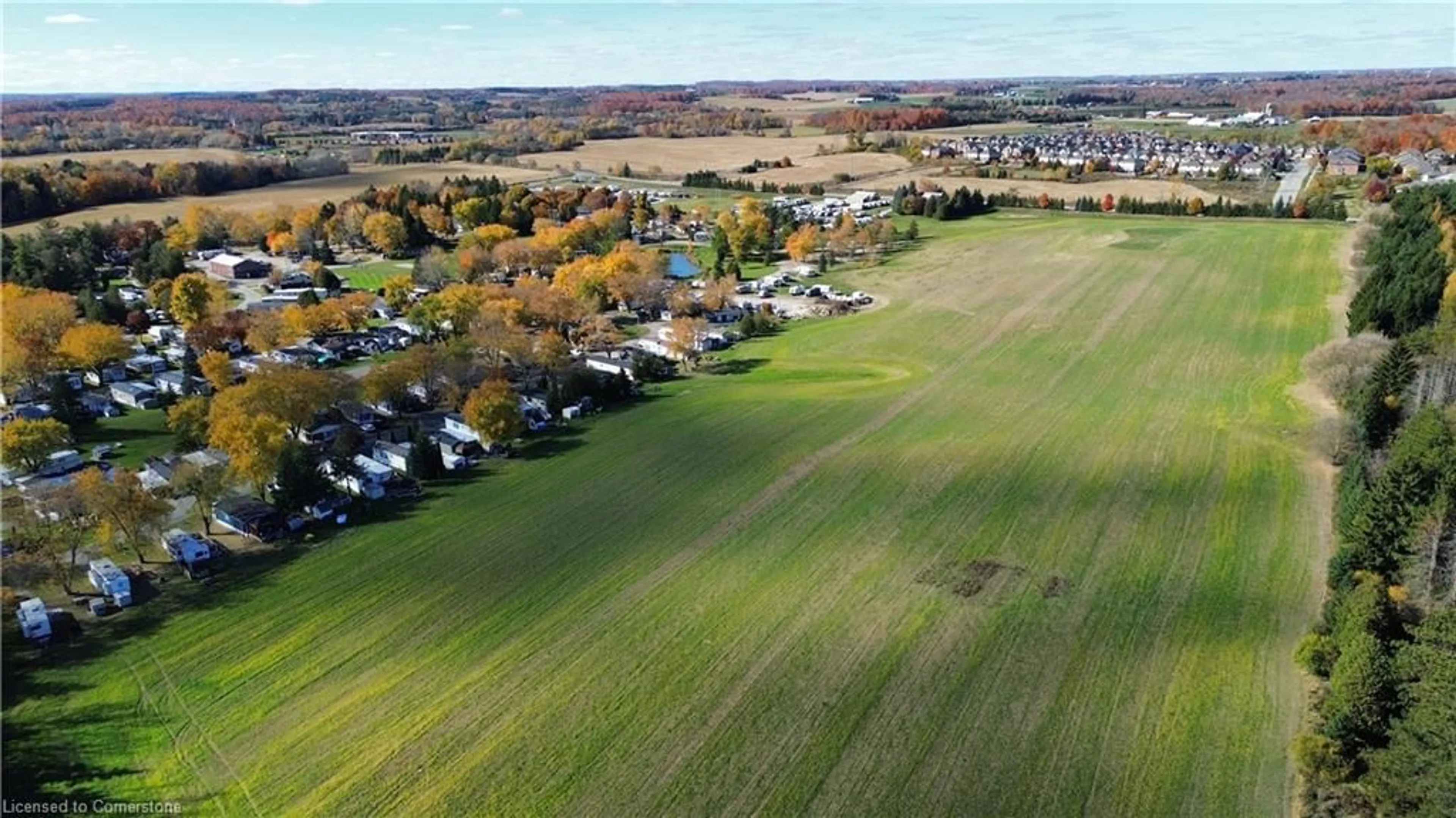 A pic from outside/outdoor area/front of a property/back of a property/a pic from drone, unknown for 580 Beaver Creek Rd #249, Waterloo Ontario N2J 3Z4