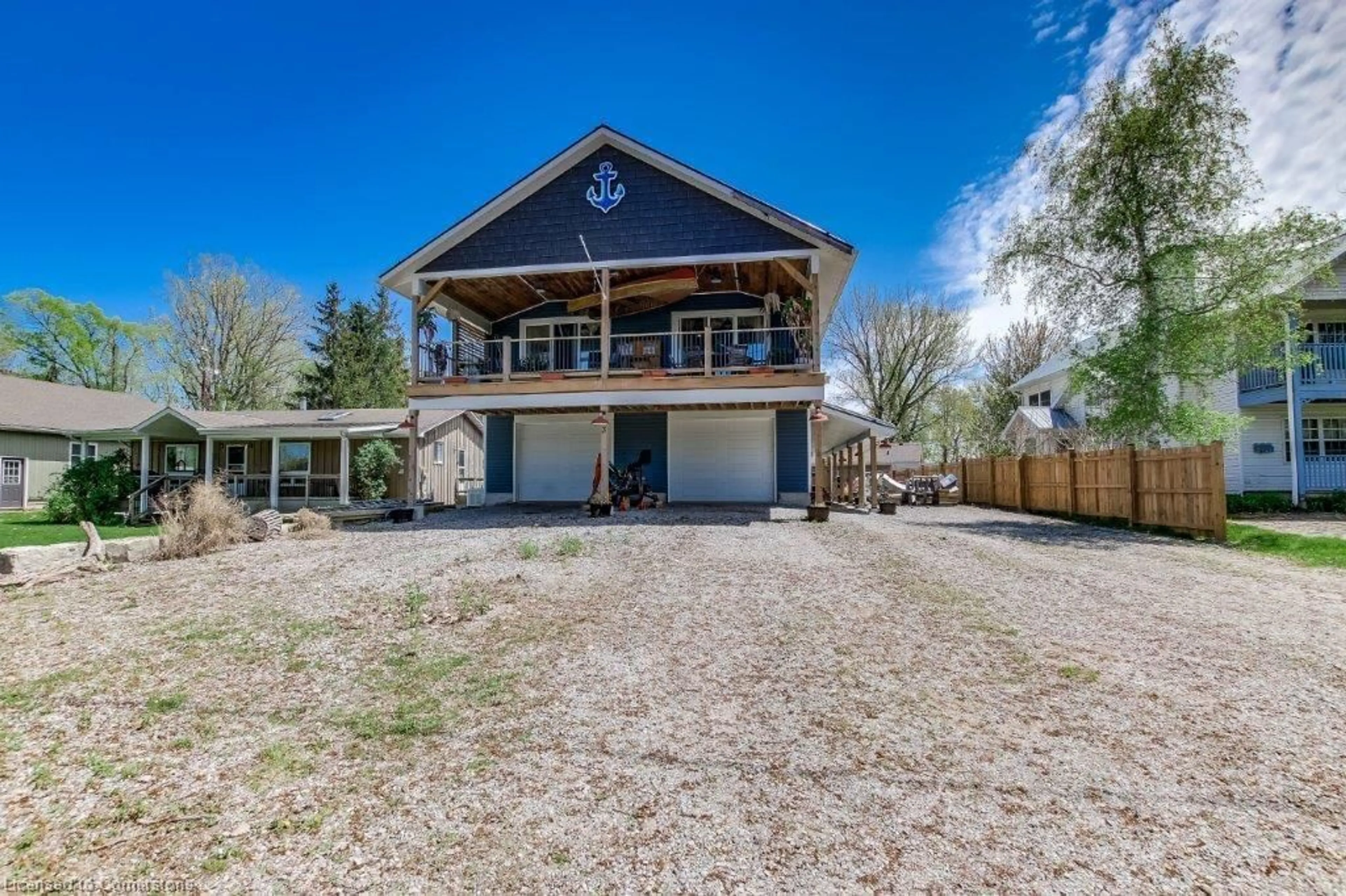 A pic from outside/outdoor area/front of a property/back of a property/a pic from drone, unknown for 3 Warbler Lane, Long Point Ontario N0E 1M0