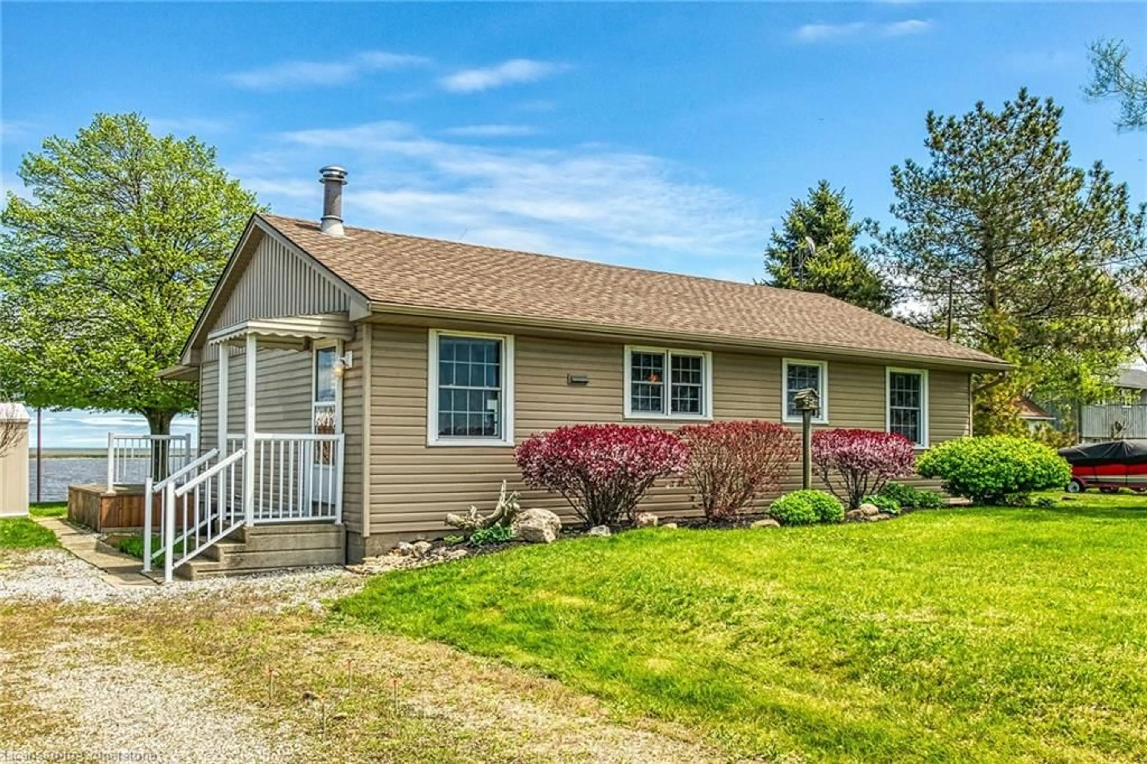 Home with vinyl exterior material, street for 794 59 Hwy, Port Rowan Ontario N0E 1M0