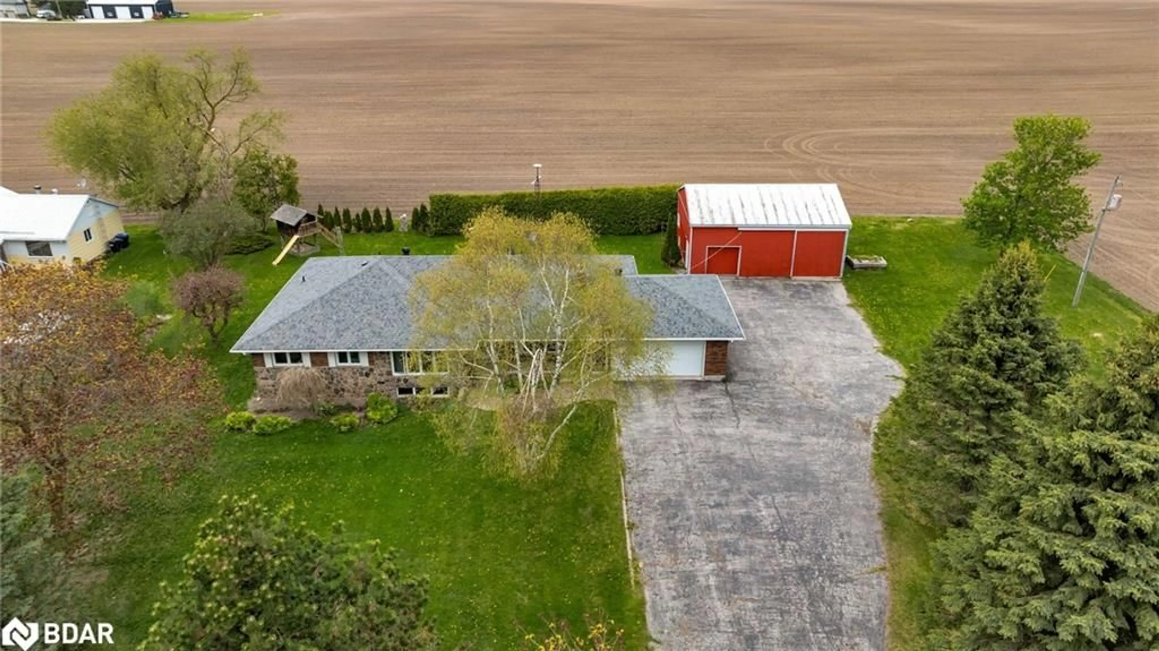 A pic from outside/outdoor area/front of a property/back of a property/a pic from drone, building for 5962 Hwy 26, Stayner Ontario L0M 1S0