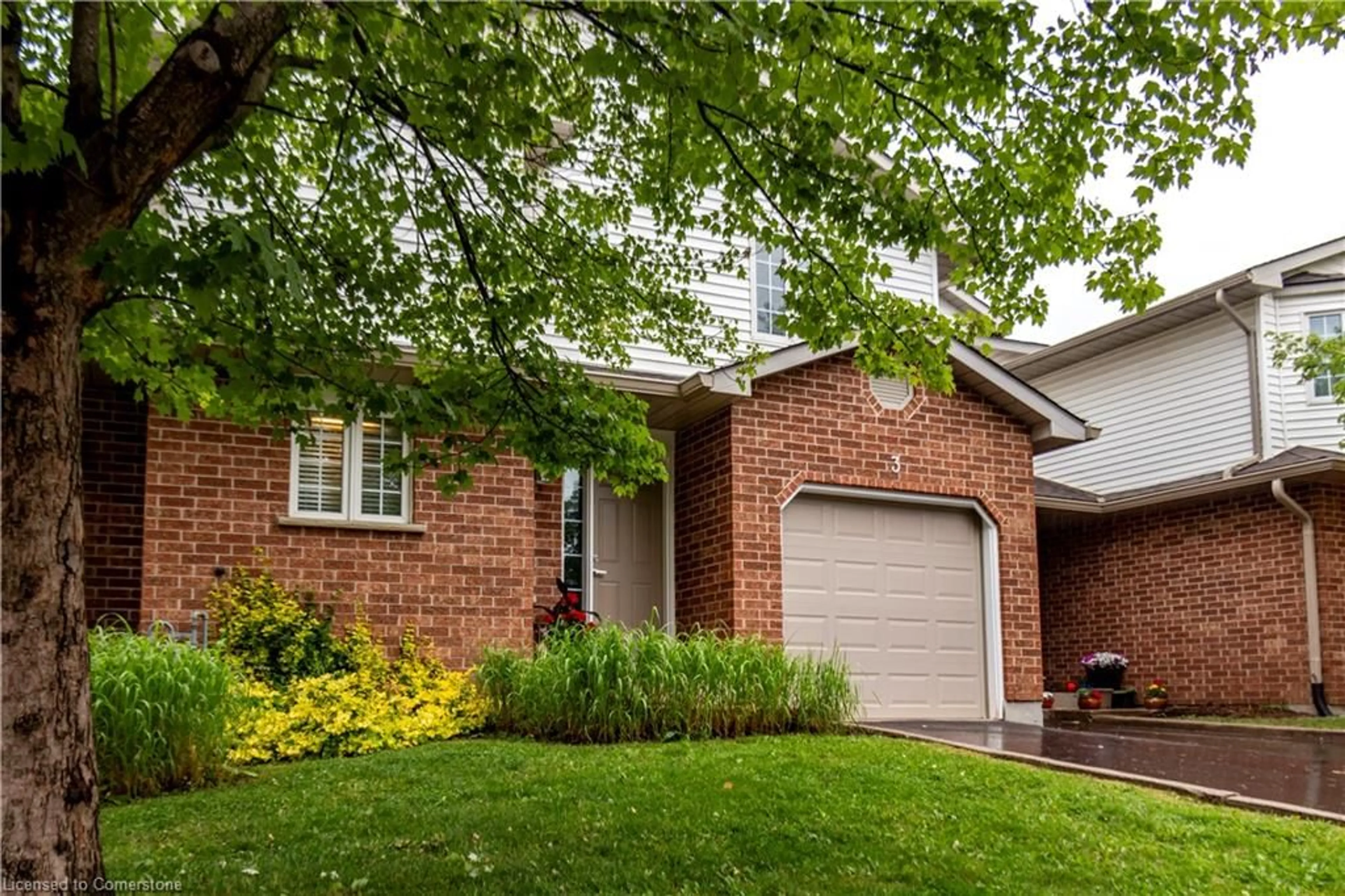 Home with brick exterior material, street for 229 Baker St #3, Waterloo Ontario N2T 2R4