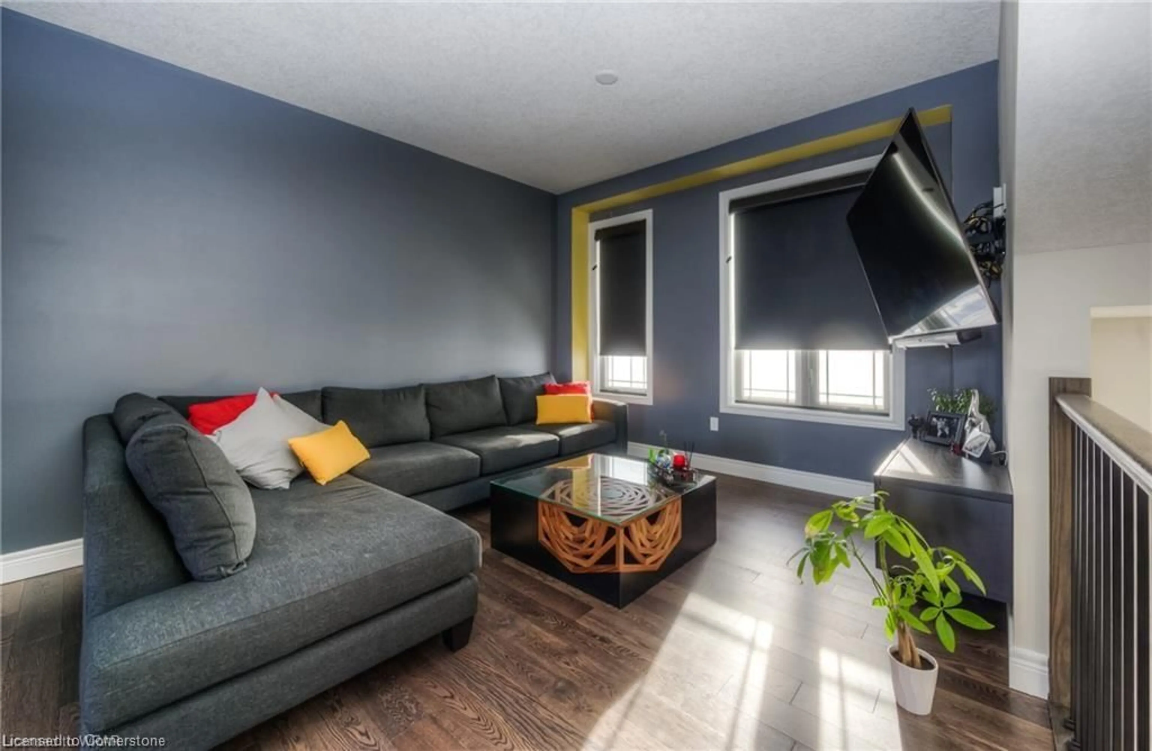Living room with furniture, wood/laminate floor for 110 Loxleigh Lane, Breslau Ontario N0B 1M0