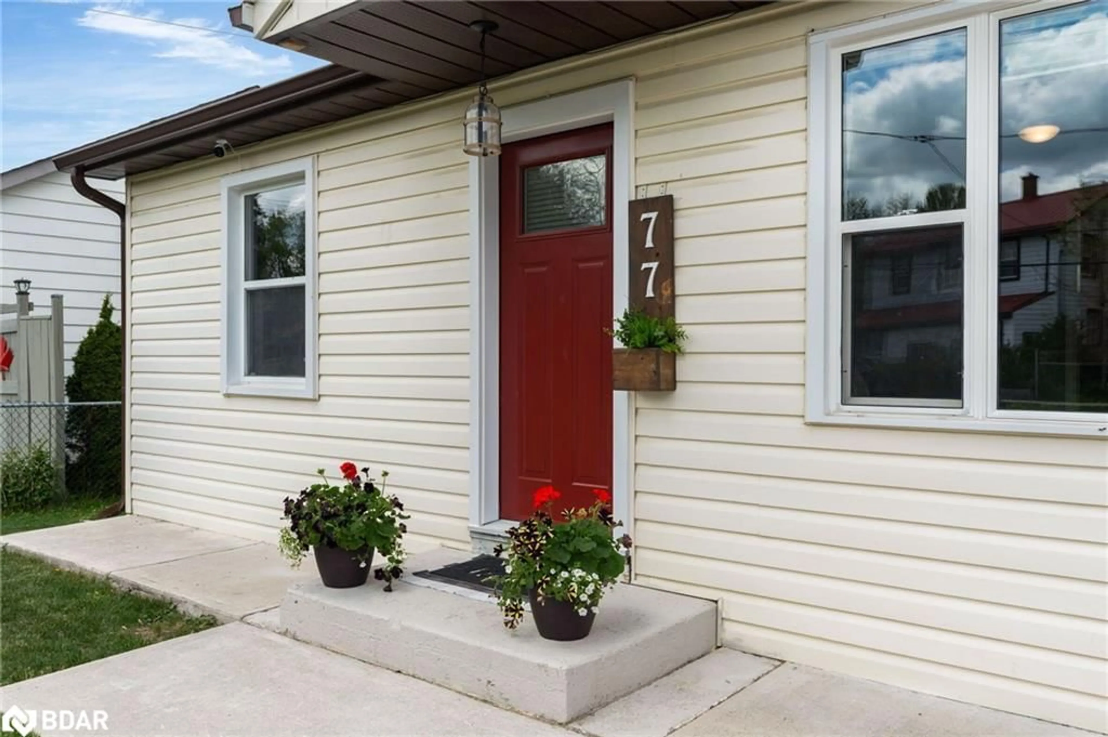 Home with vinyl exterior material, street for 77 Curtis St, Angus Ontario L0M 1B0