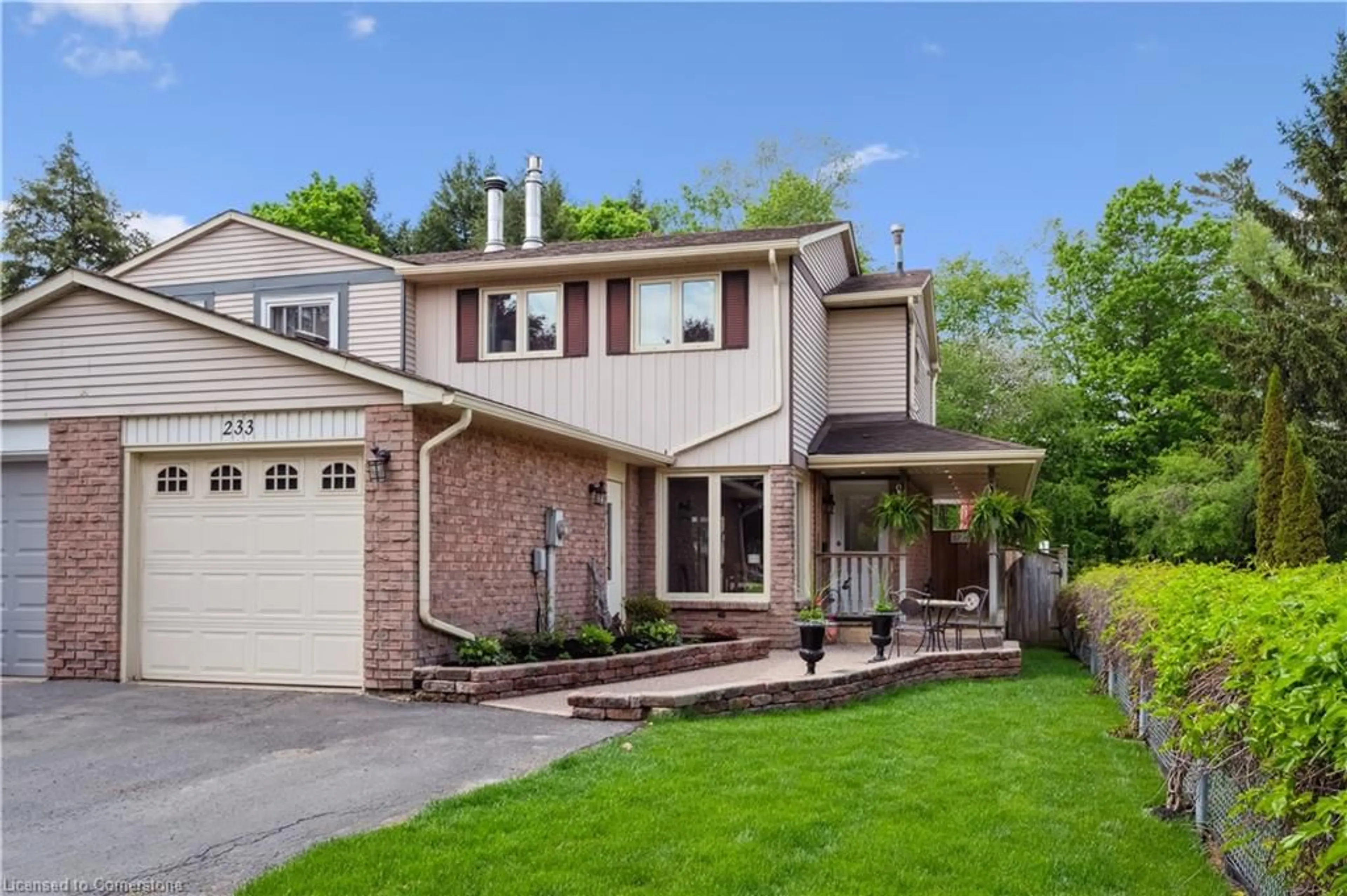 Home with brick exterior material, street for 233 Bechtel Dr, Kitchener Ontario N2P 1P8