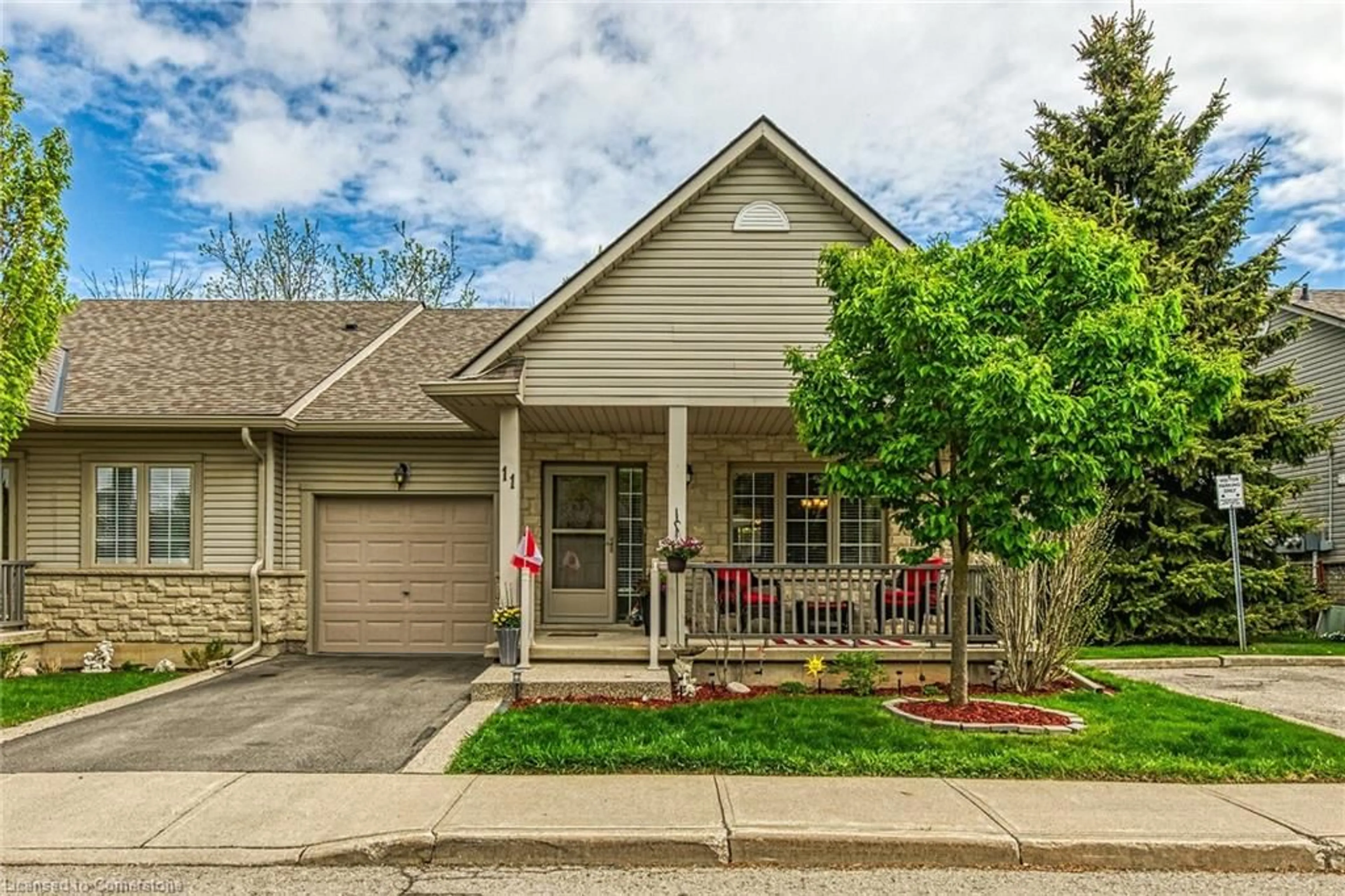 Home with brick exterior material, street for 34 Southbrook Dr #11, Binbrook Ontario L0R 1C0