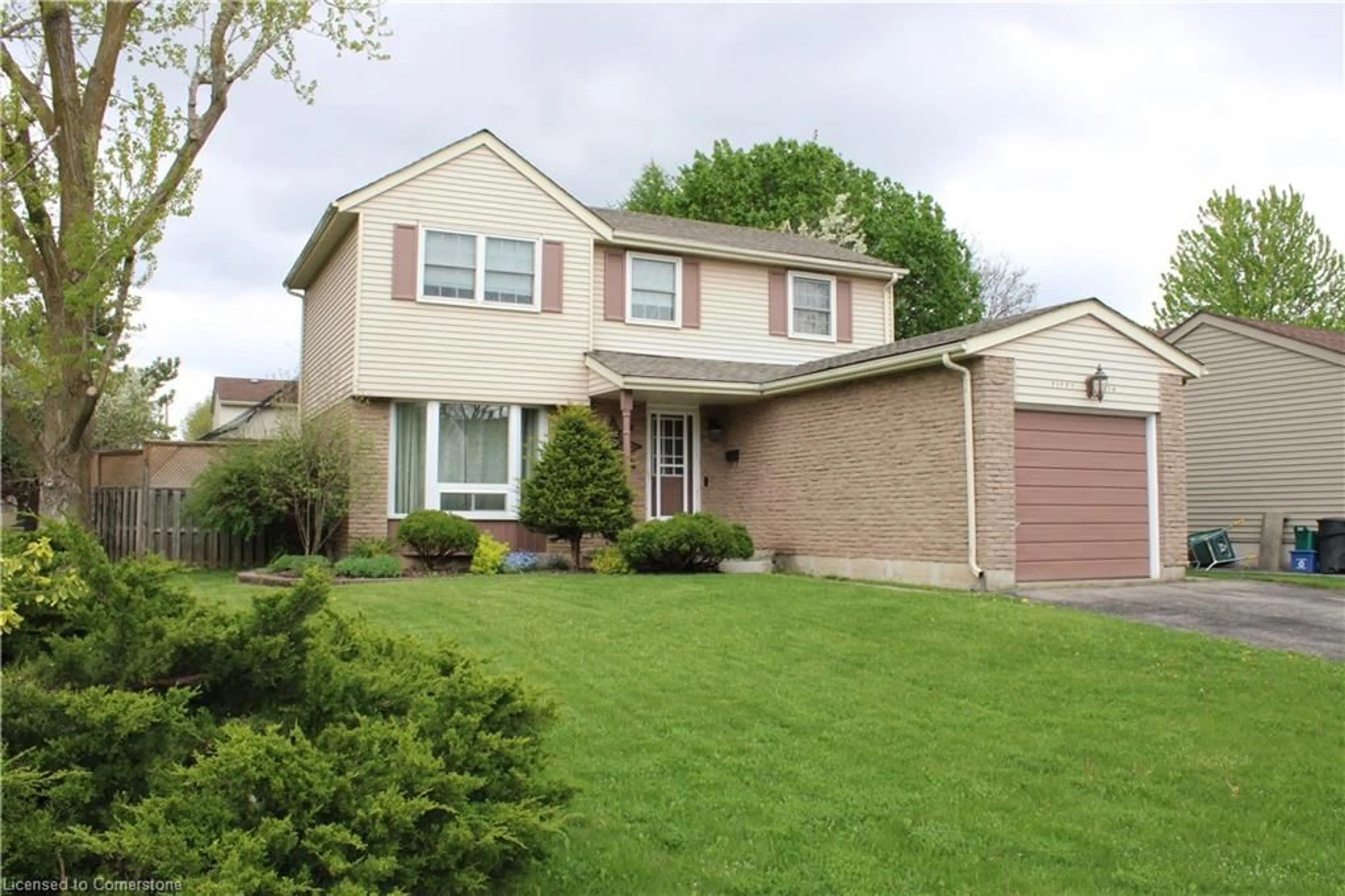 Home with vinyl exterior material, street for 56 Trailwood Cres, Kitchener Ontario N2N 1V7