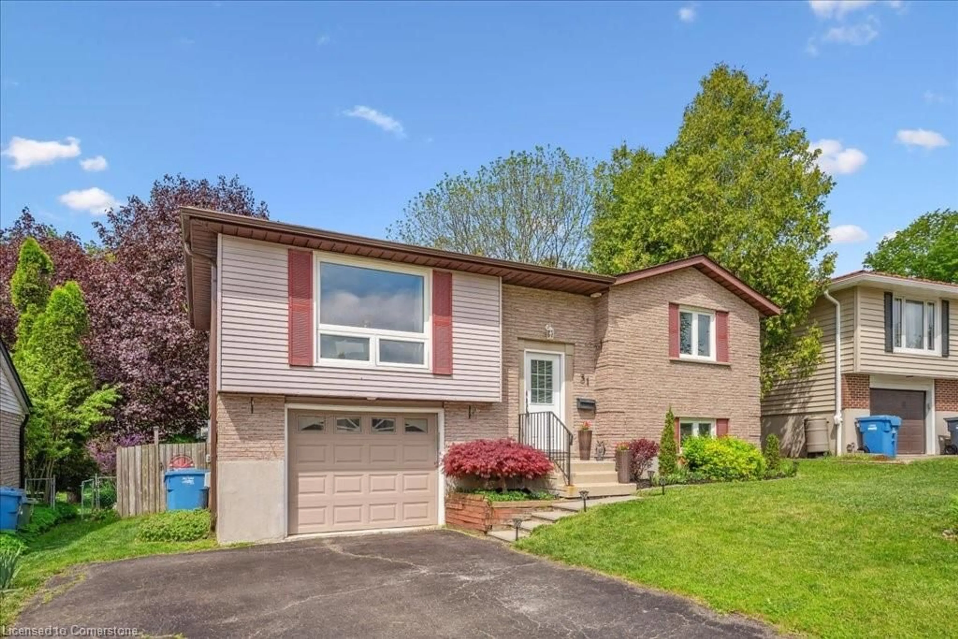 Home with vinyl exterior material, street for 31 Carey Cres, Guelph Ontario N1H 7J9