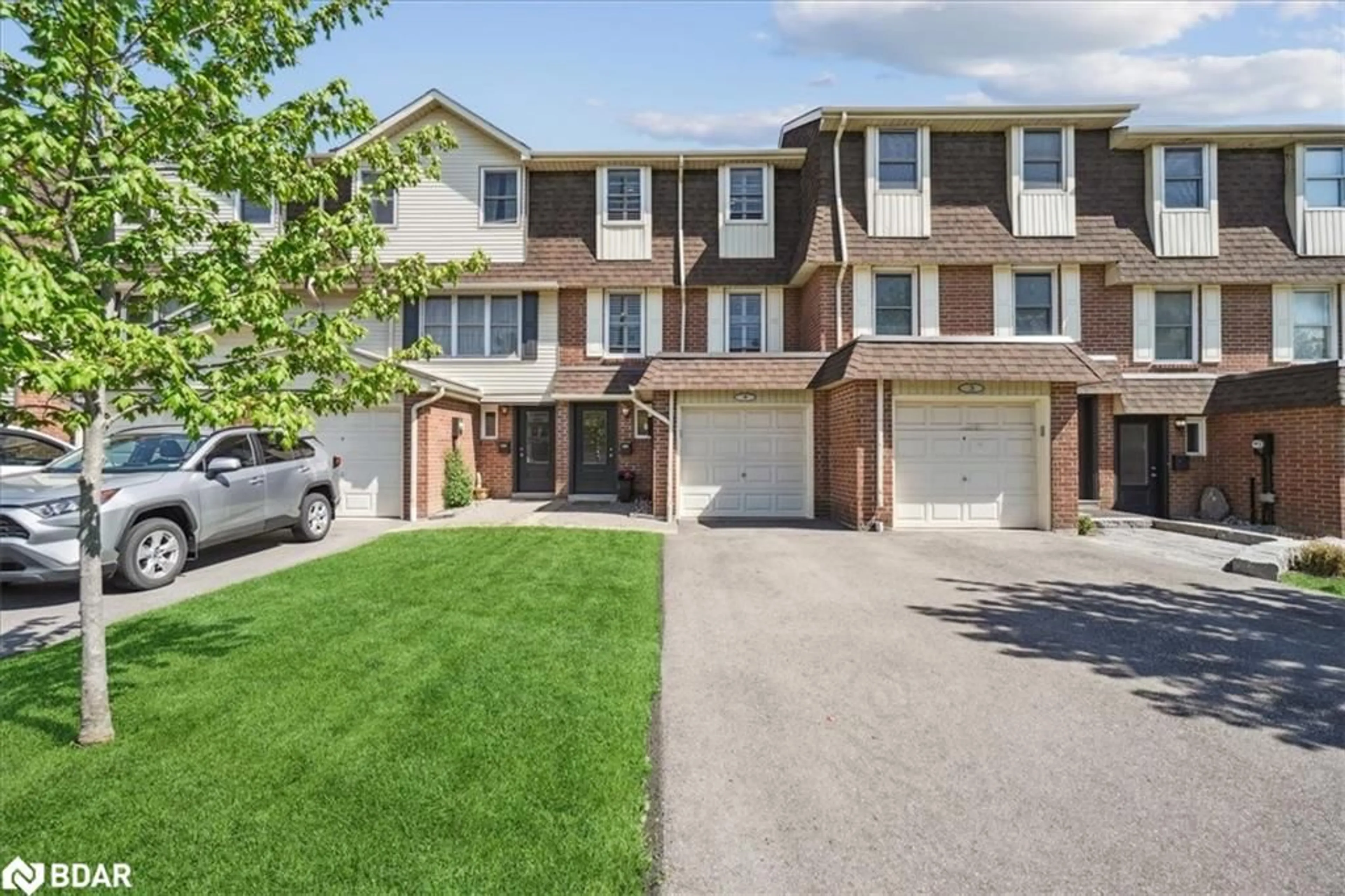 A pic from outside/outdoor area/front of a property/back of a property/a pic from drone, street for 30 Heslop Rd #4, Milton Ontario L9T 1B3