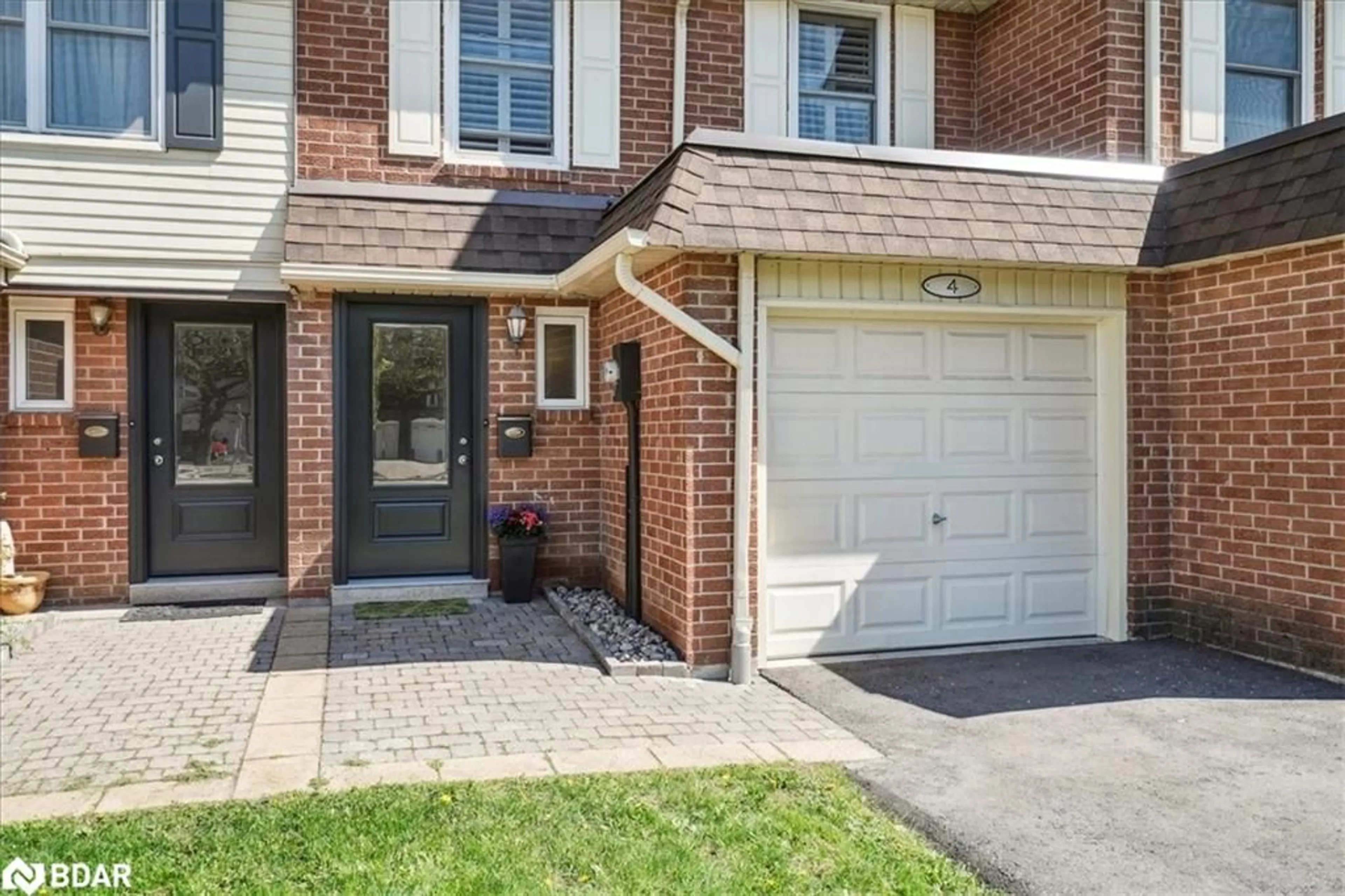 Home with brick exterior material, street for 30 Heslop Rd #4, Milton Ontario L9T 1B3