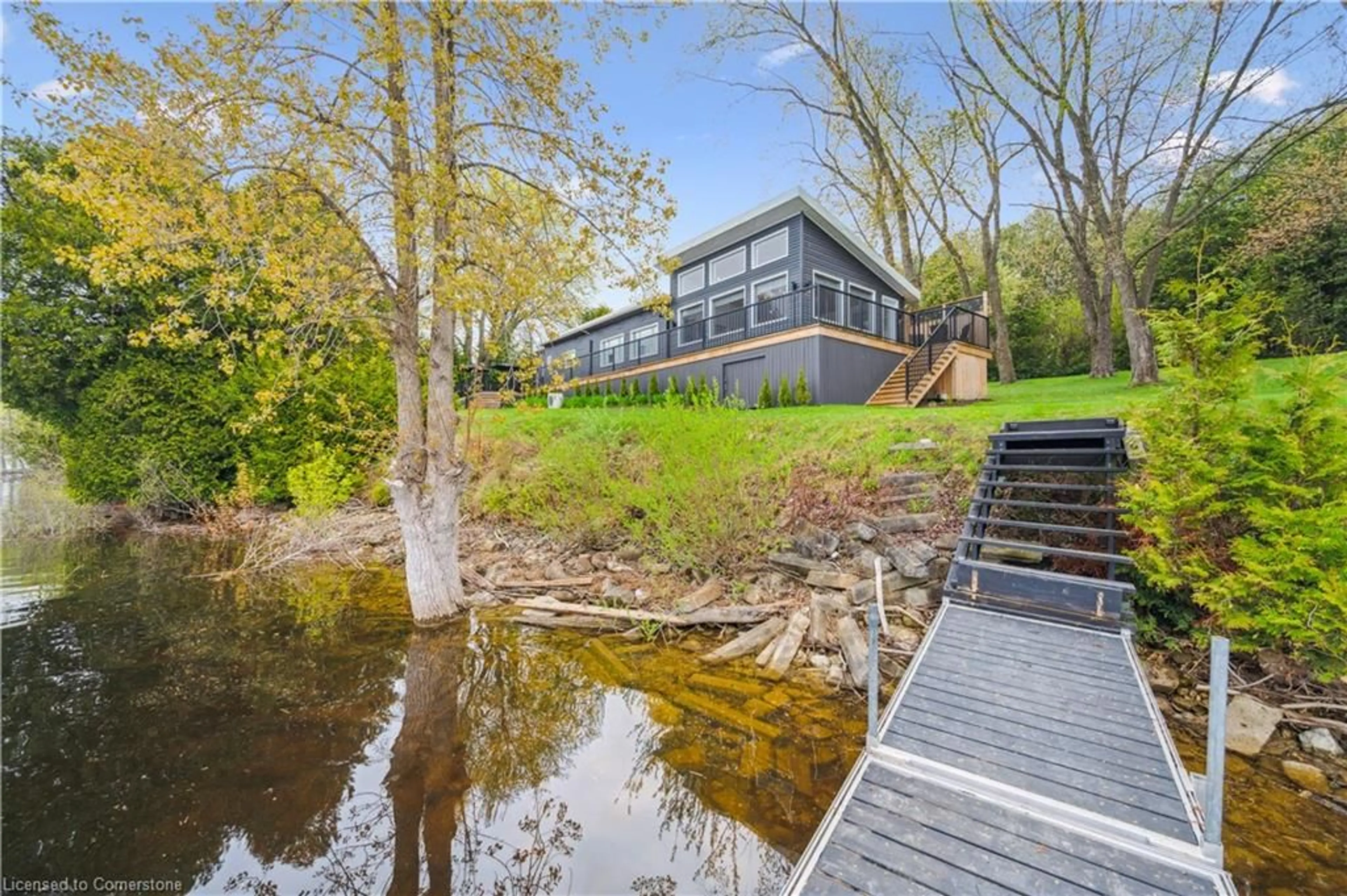 A pic from outside/outdoor area/front of a property/back of a property/a pic from drone, water/lake/river/ocean view for 621 Sixth St, Belwood Ontario N0B 1J0