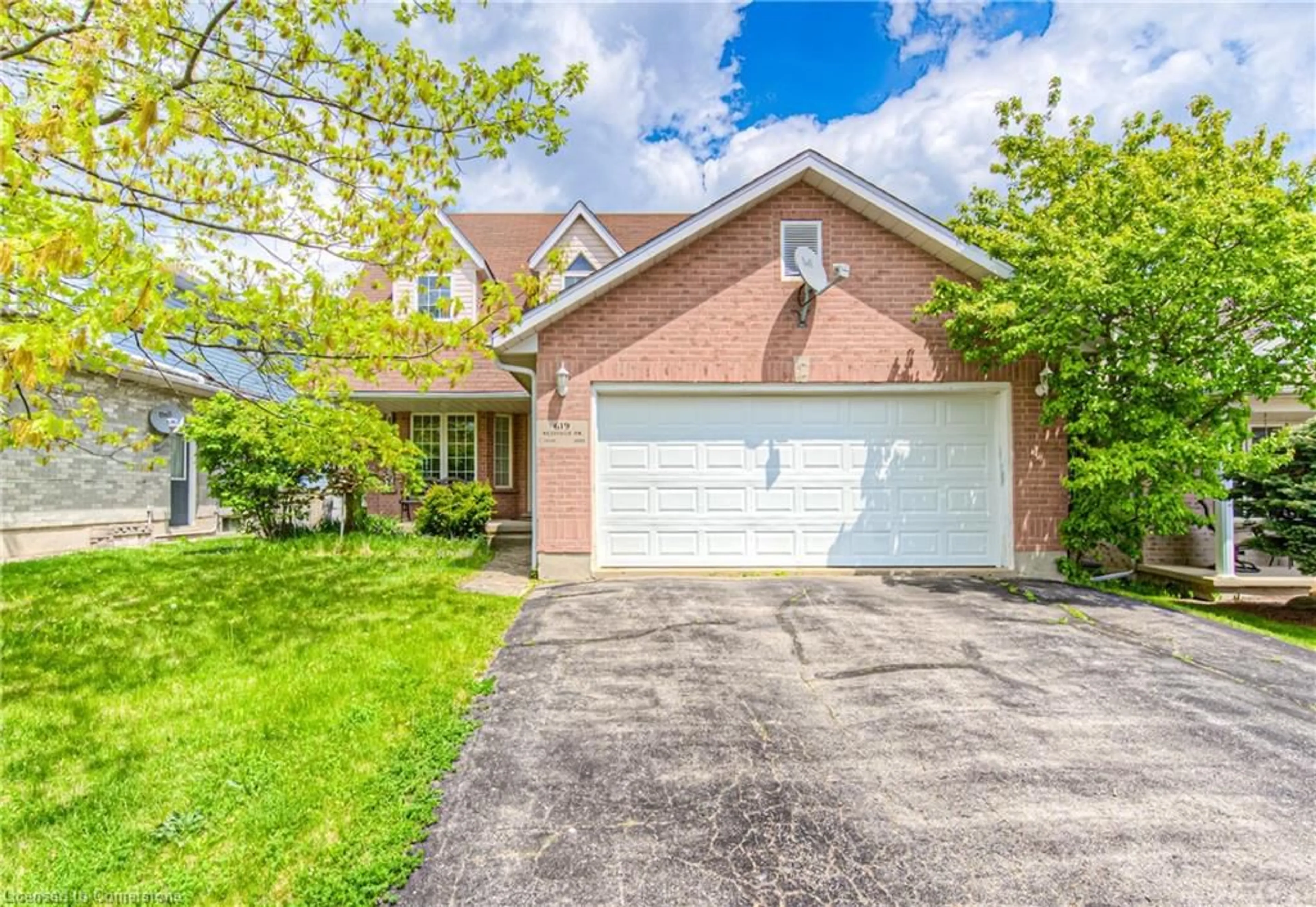 Home with brick exterior material, street for 619 Westfield Dr, Waterloo Ontario N2T 2P2