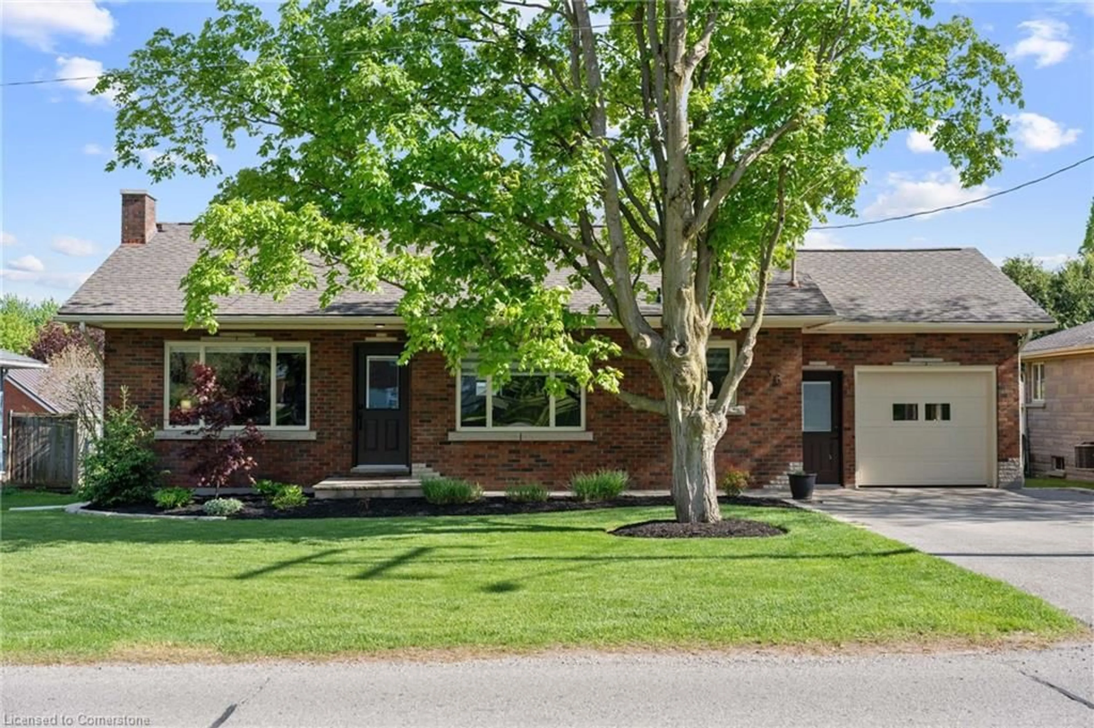 Home with brick exterior material, street for 36 Wilson Ave, Delhi Ontario N4B 1B5