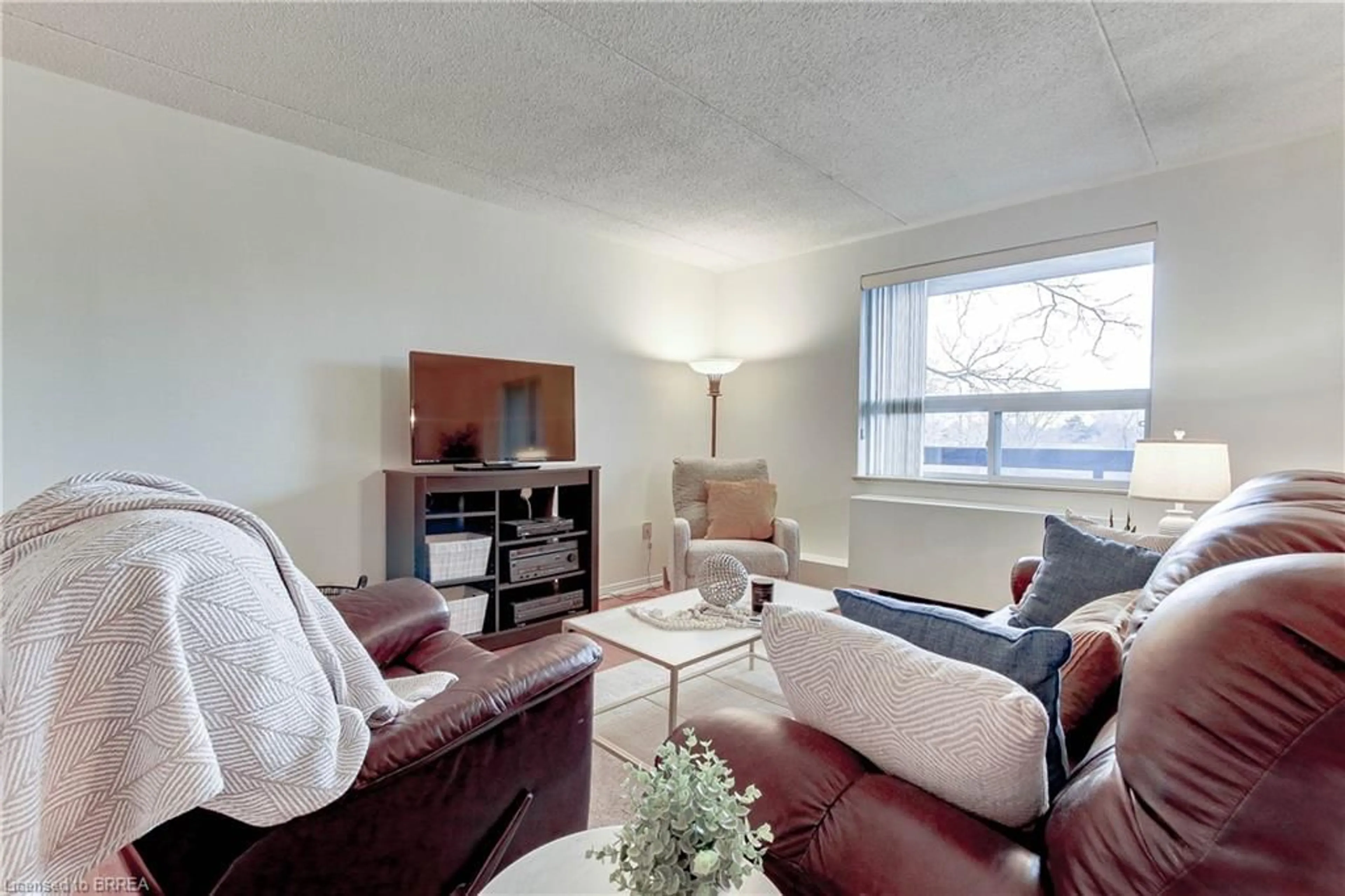 Living room with furniture, unknown for 88 Tollgate Rd #205, Brantford Ontario N3R 7R5