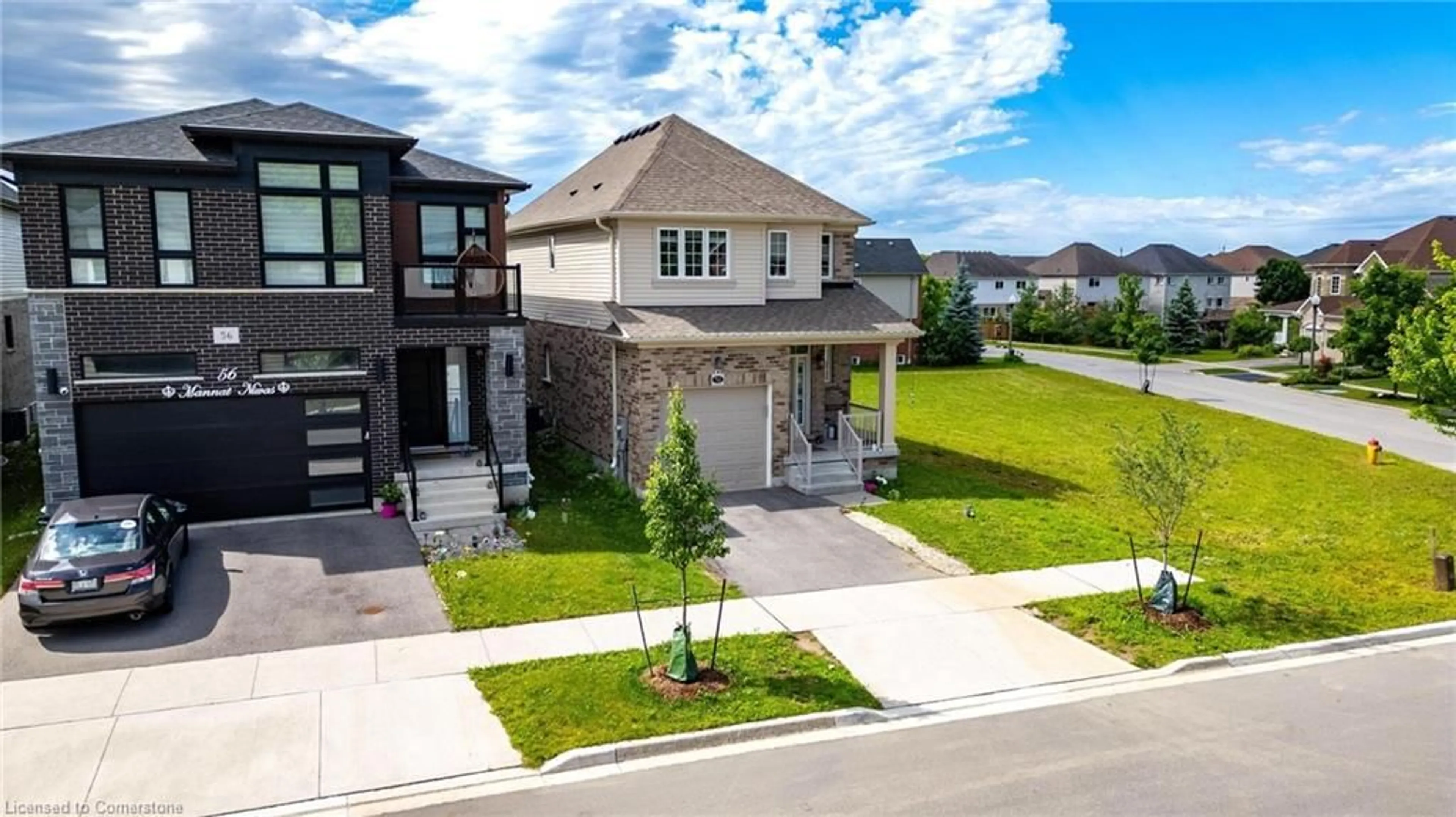 A pic from outside/outdoor area/front of a property/back of a property/a pic from drone, street for 52 Monarch Woods Dr, Kitchener Ontario N2P 2Y9