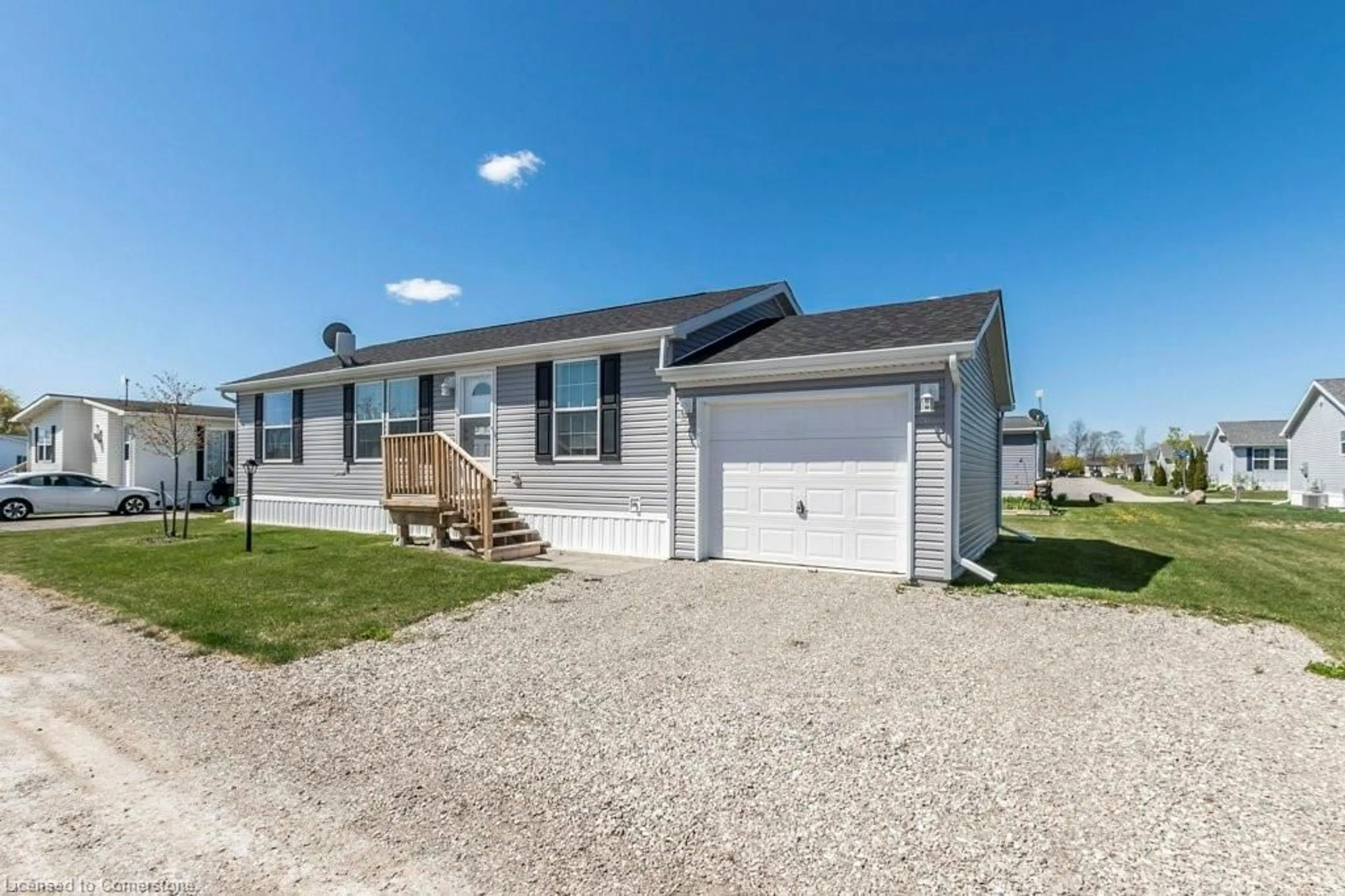 Home with vinyl exterior material, street for 9 Hickory Hollow, Nanticoke Ontario N0A 1L0