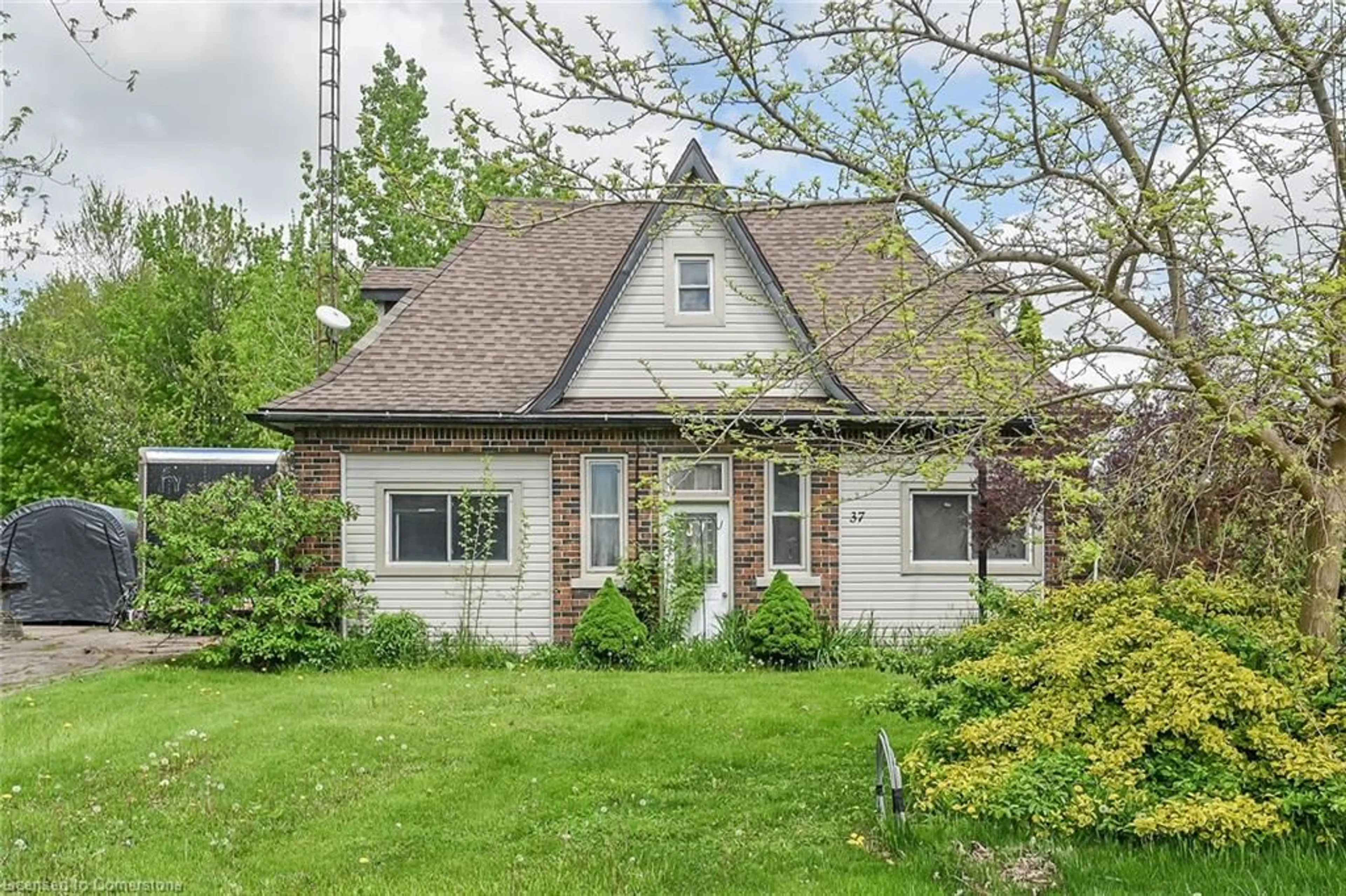 Home with brick exterior material, street for 37 Talbot Rd, Canfield Ontario N0A 1C0