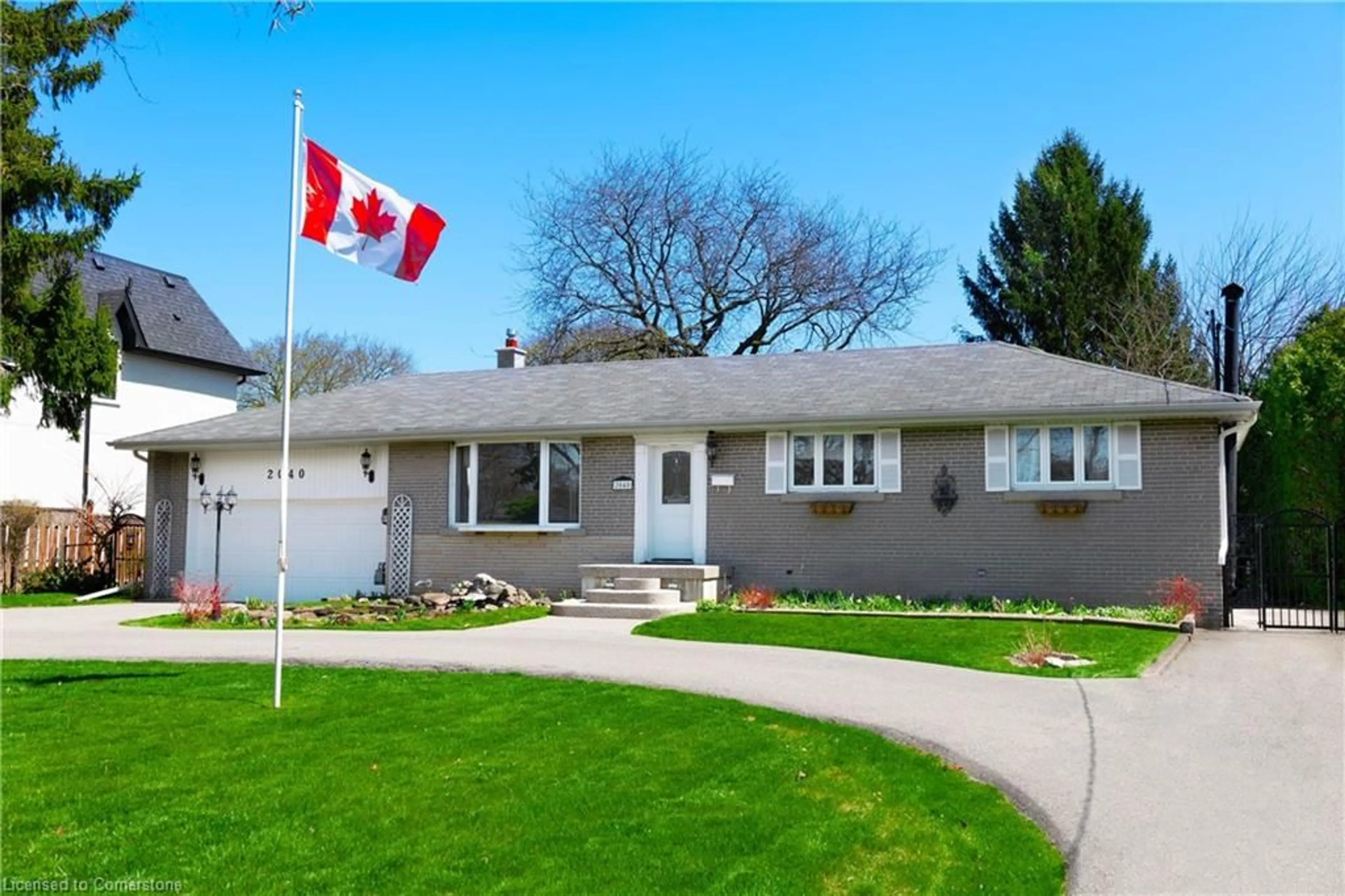 Home with vinyl exterior material, street for 2040 Rebecca St, Oakville Ontario L6L 2A2