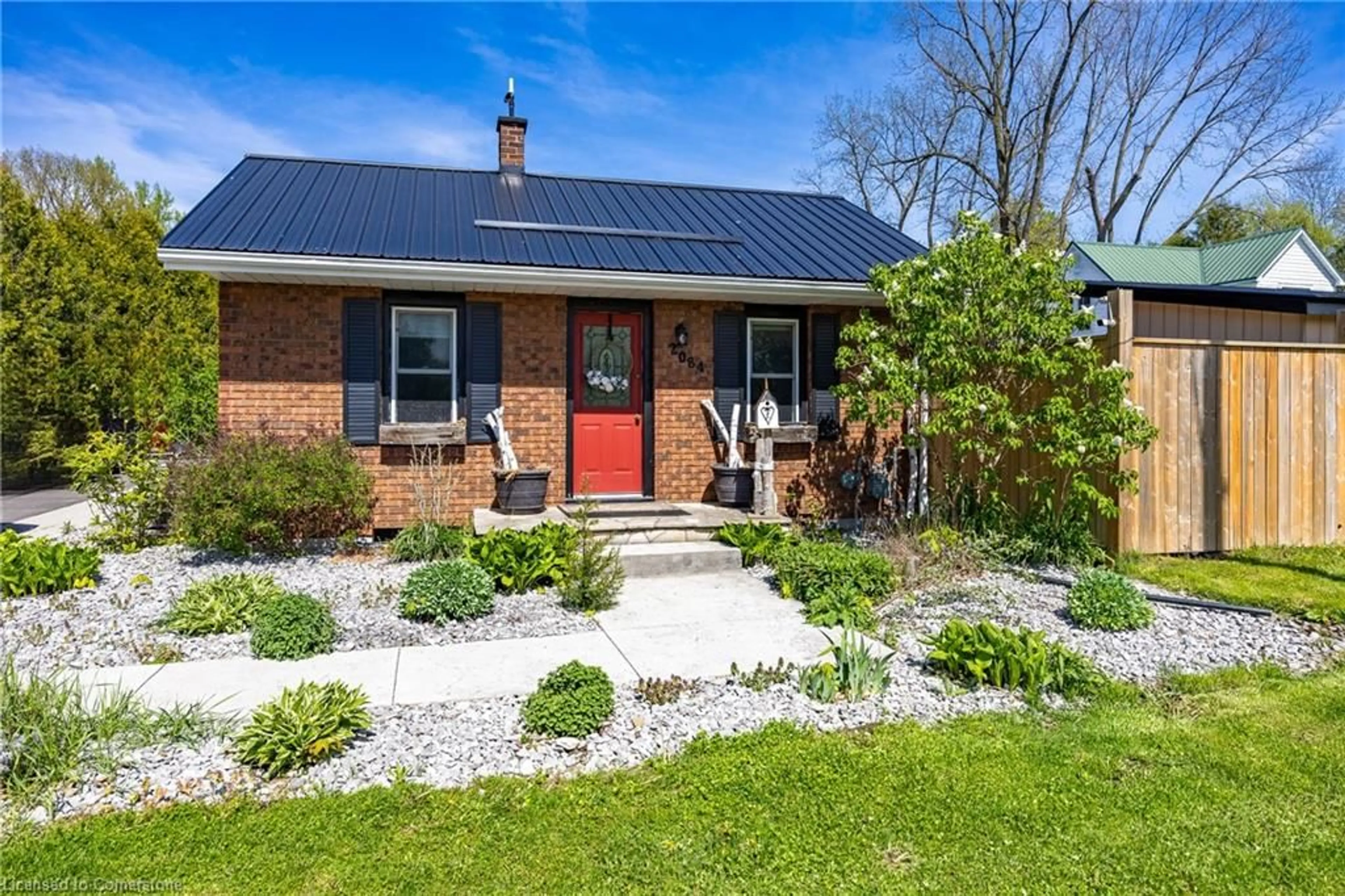 Home with brick exterior material, street for 2084 Main St, Walsingham Ontario N0E 1X0