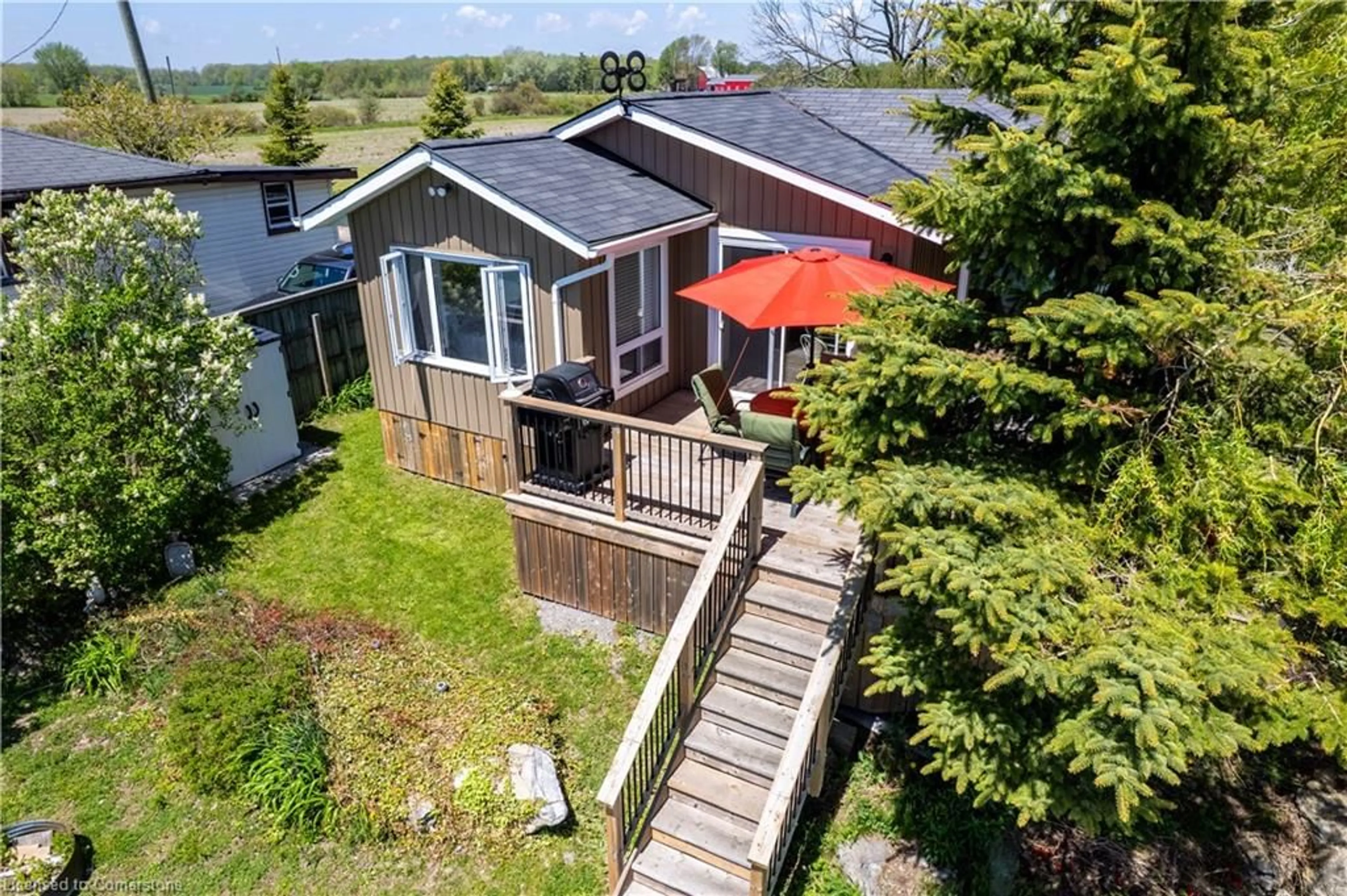 A pic from outside/outdoor area/front of a property/back of a property/a pic from drone, unknown for 33 Gull Line, Lowbanks Ontario N0A 1K0