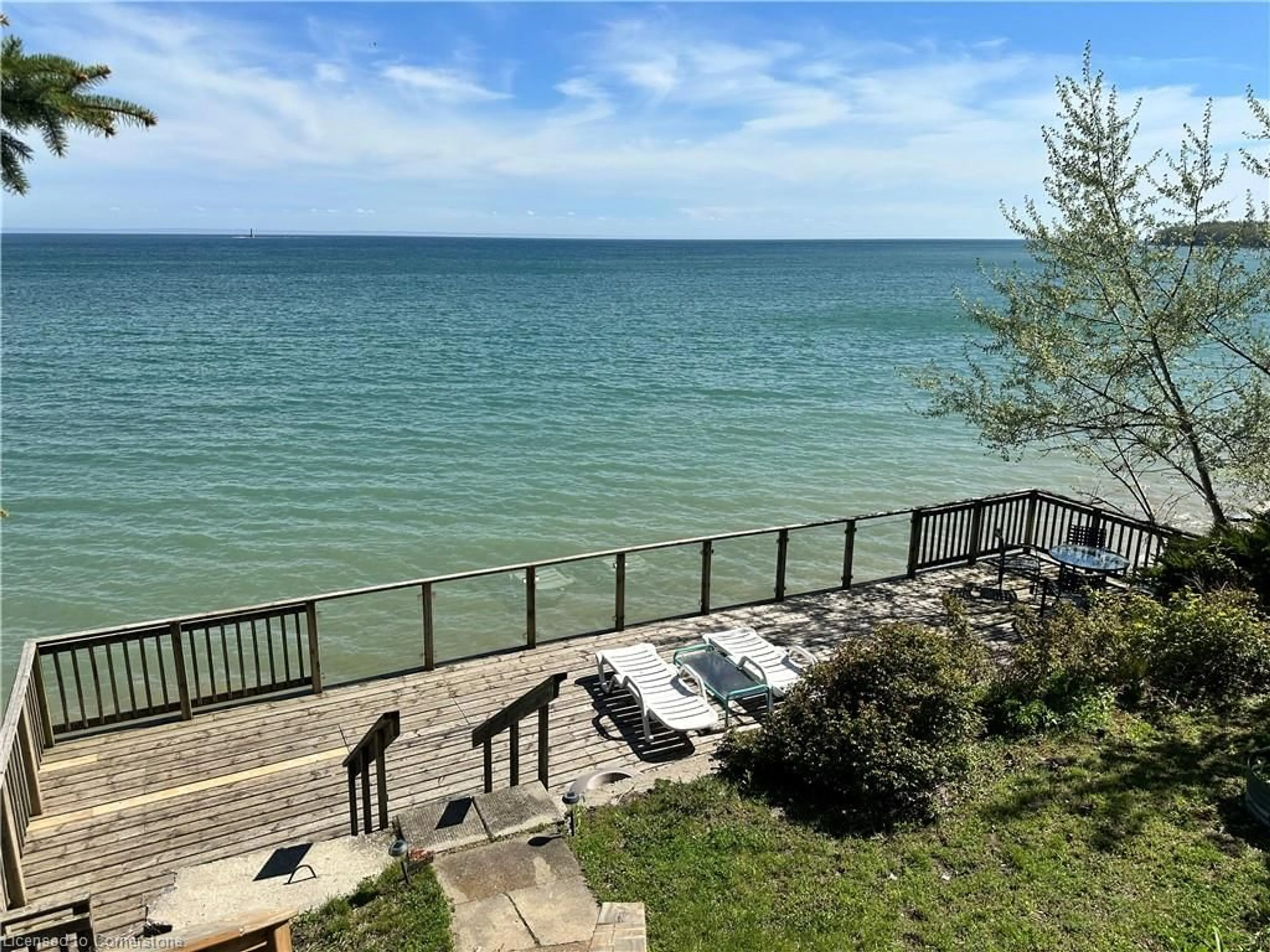 A pic from outside/outdoor area/front of a property/back of a property/a pic from drone, water/lake/river/ocean view for 33 Gull Line, Lowbanks Ontario N0A 1K0