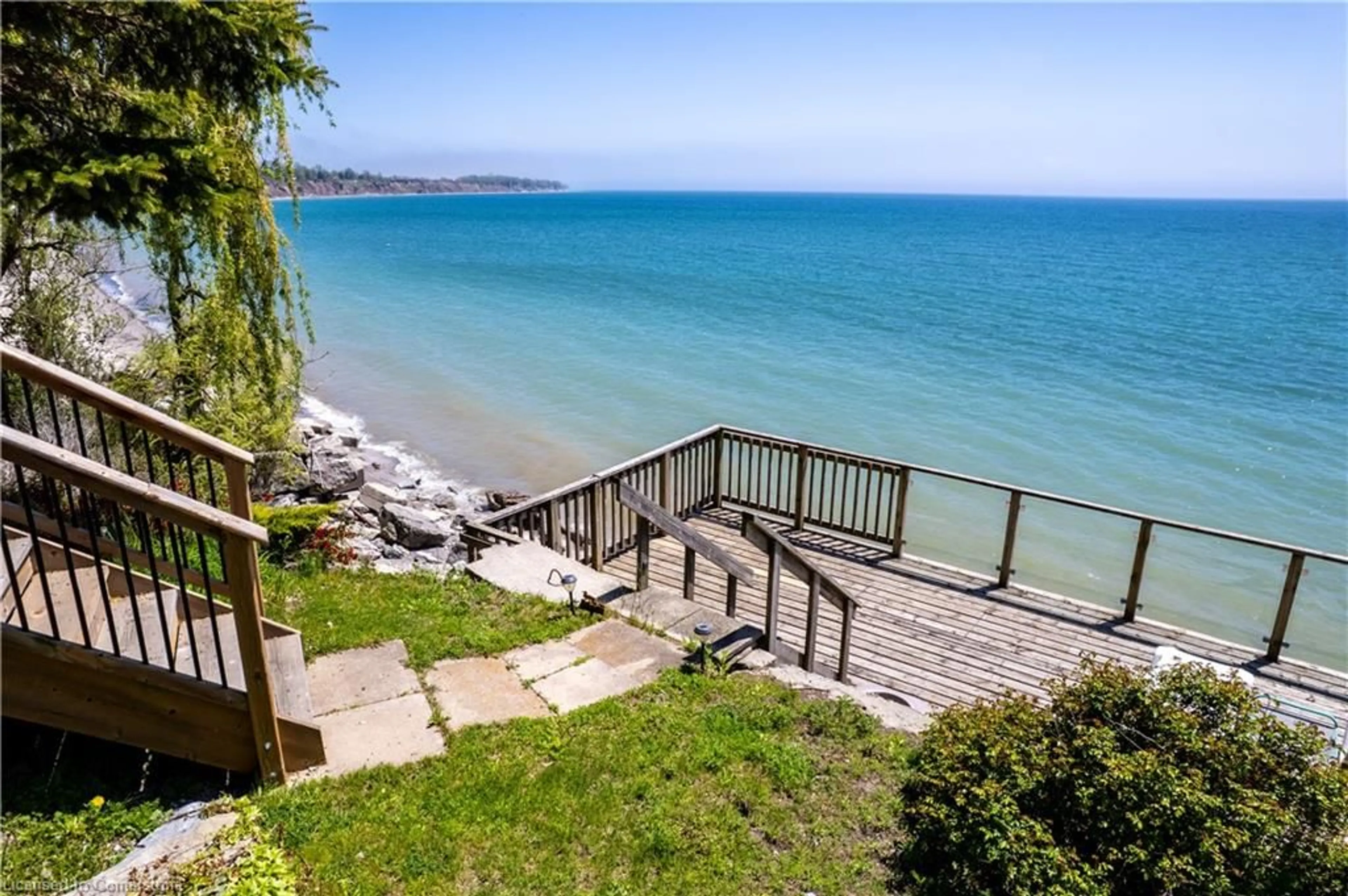 A pic from outside/outdoor area/front of a property/back of a property/a pic from drone, water/lake/river/ocean view for 33 Gull Line, Lowbanks Ontario N0A 1K0