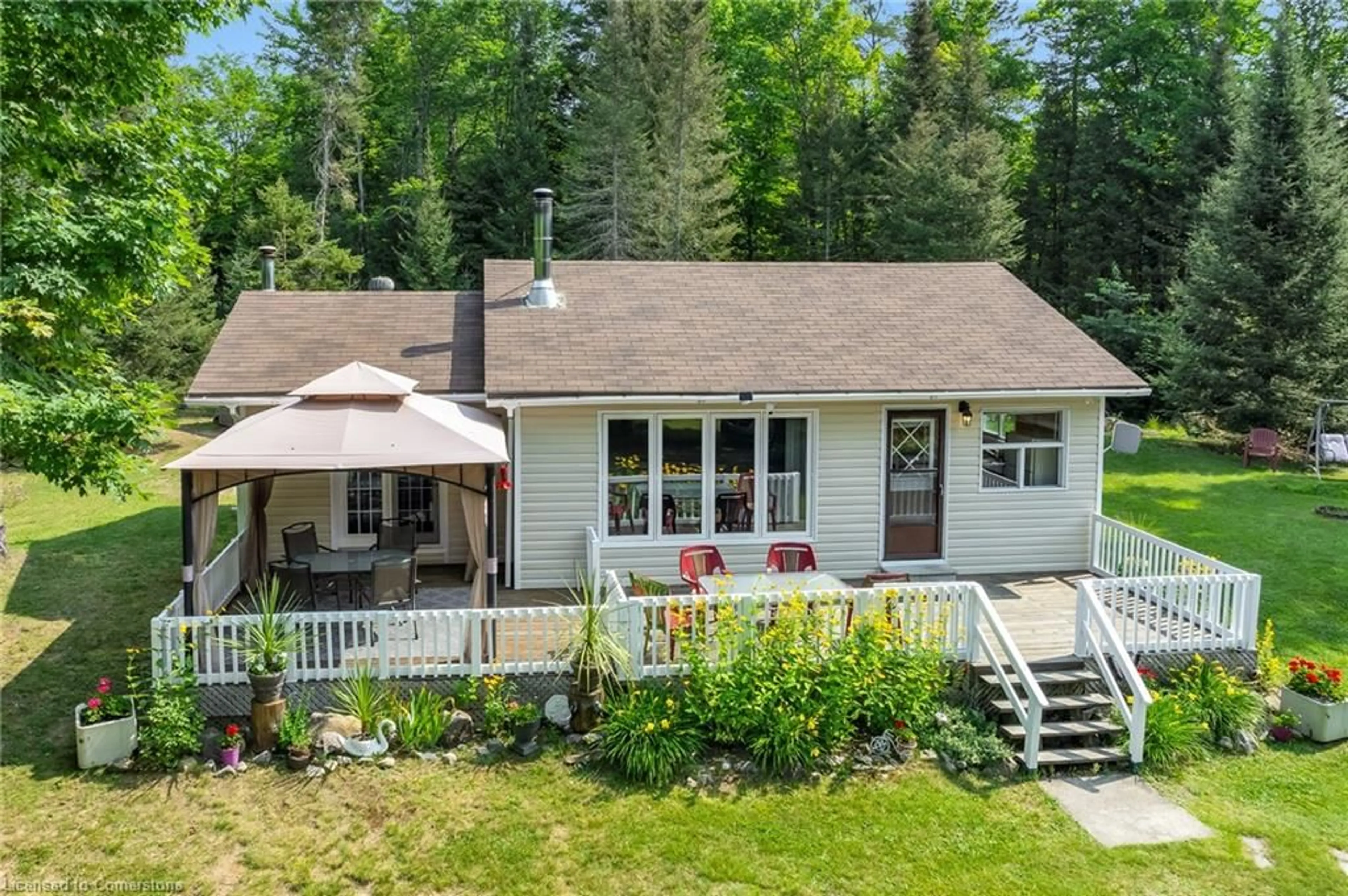 A pic from outside/outdoor area/front of a property/back of a property/a pic from drone, unknown for 2288 Eagle Lk Rd Rd, Machar Ontario P0A 1X0