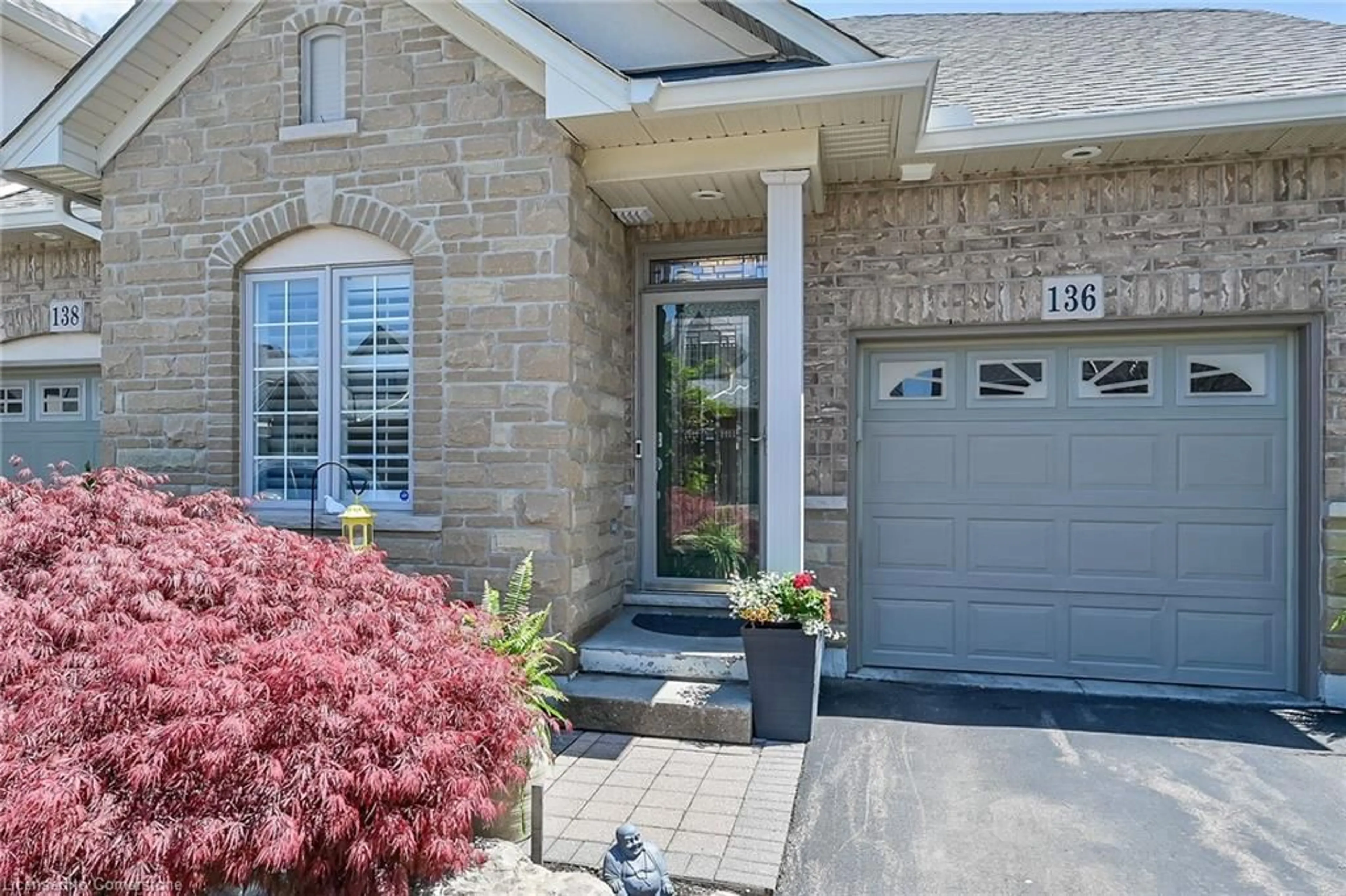 Home with brick exterior material, street for 136 Oakhampton Trail, Glanbrook Ontario L9B 0A3