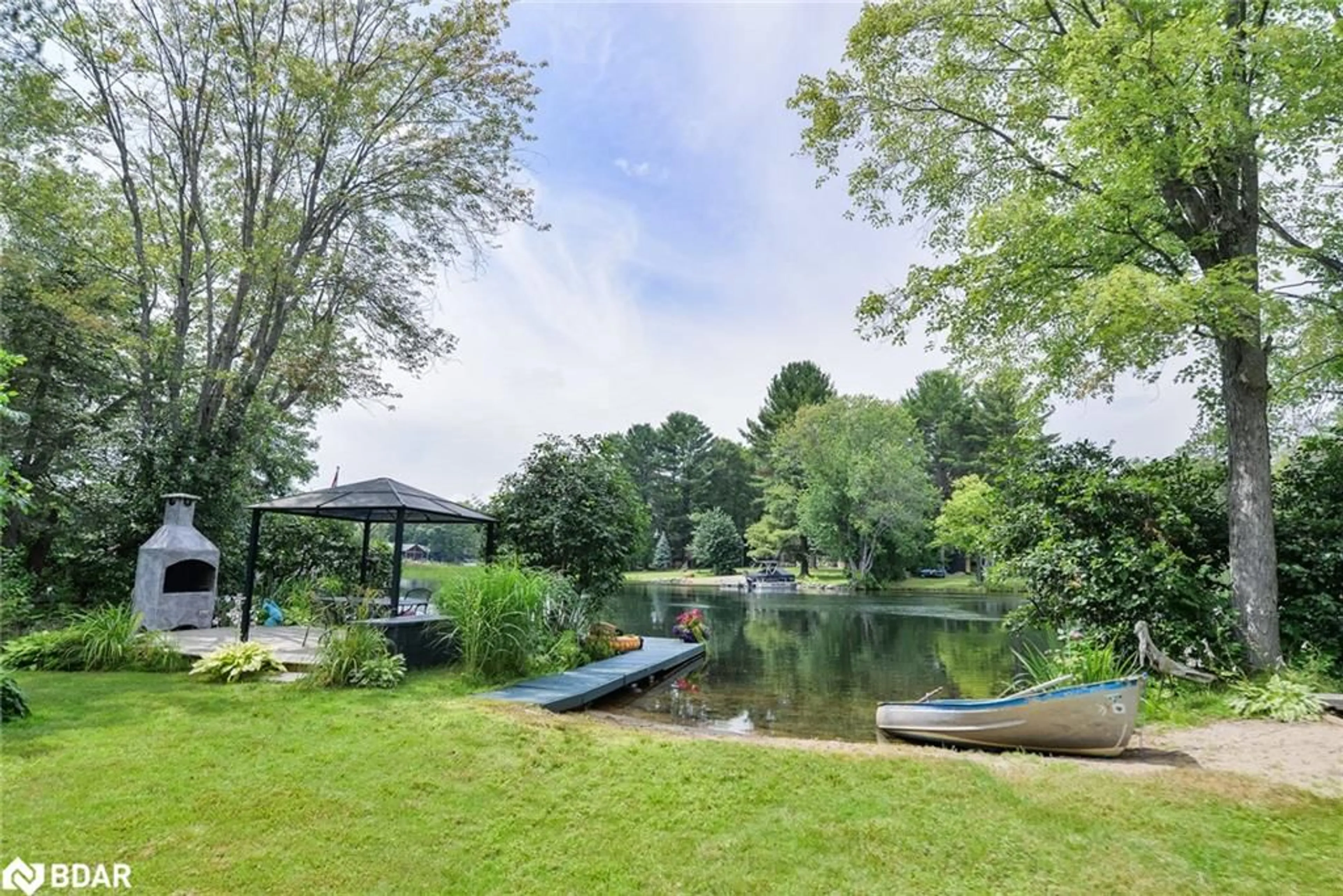 A pic from outside/outdoor area/front of a property/back of a property/a pic from drone, water/lake/river/ocean view for 7862 Birch Dr, Washago Ontario L0K 2B0