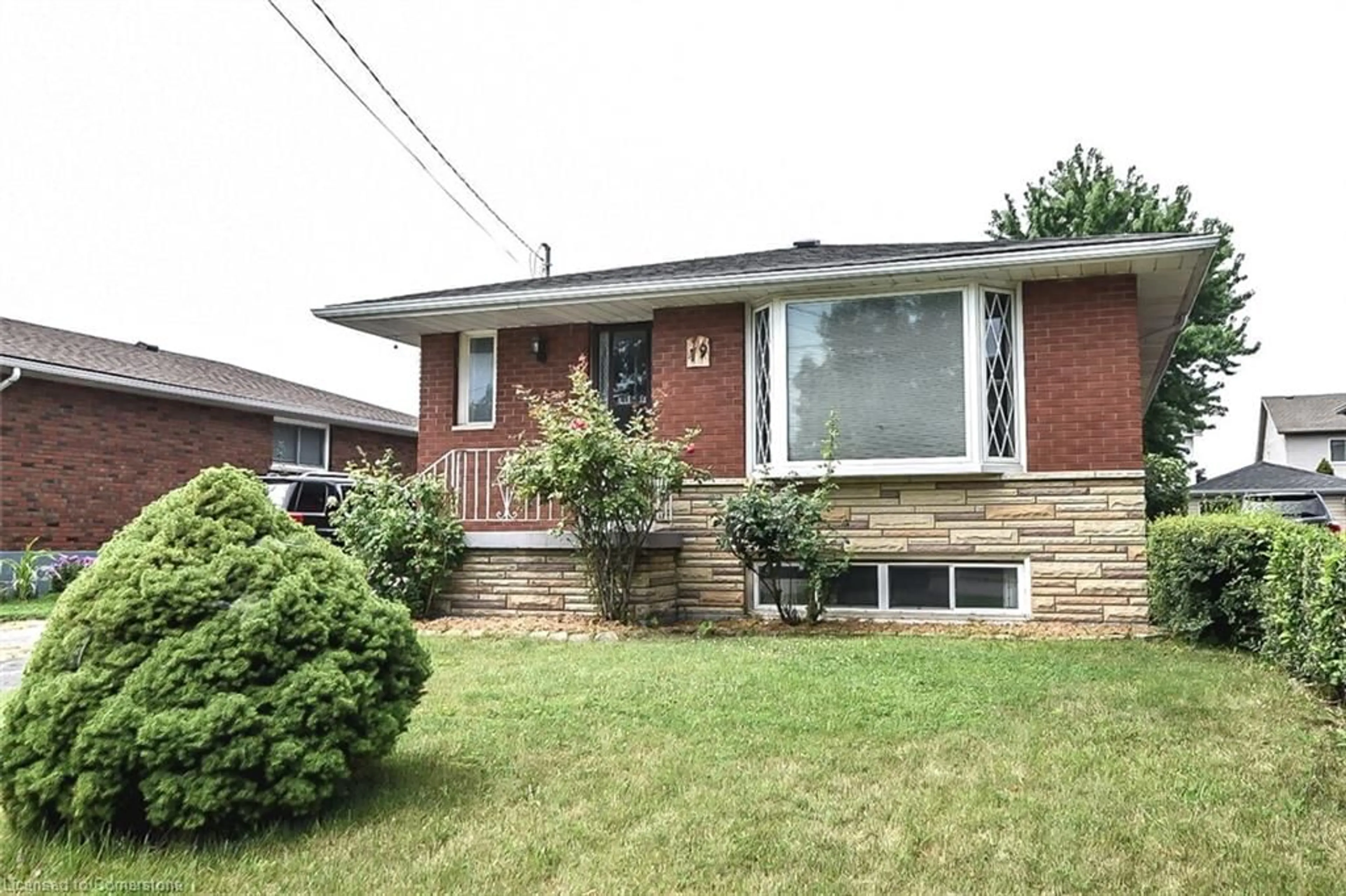 Home with brick exterior material, street for 79 Nash Rd, Hamilton Ontario L8H 2P5
