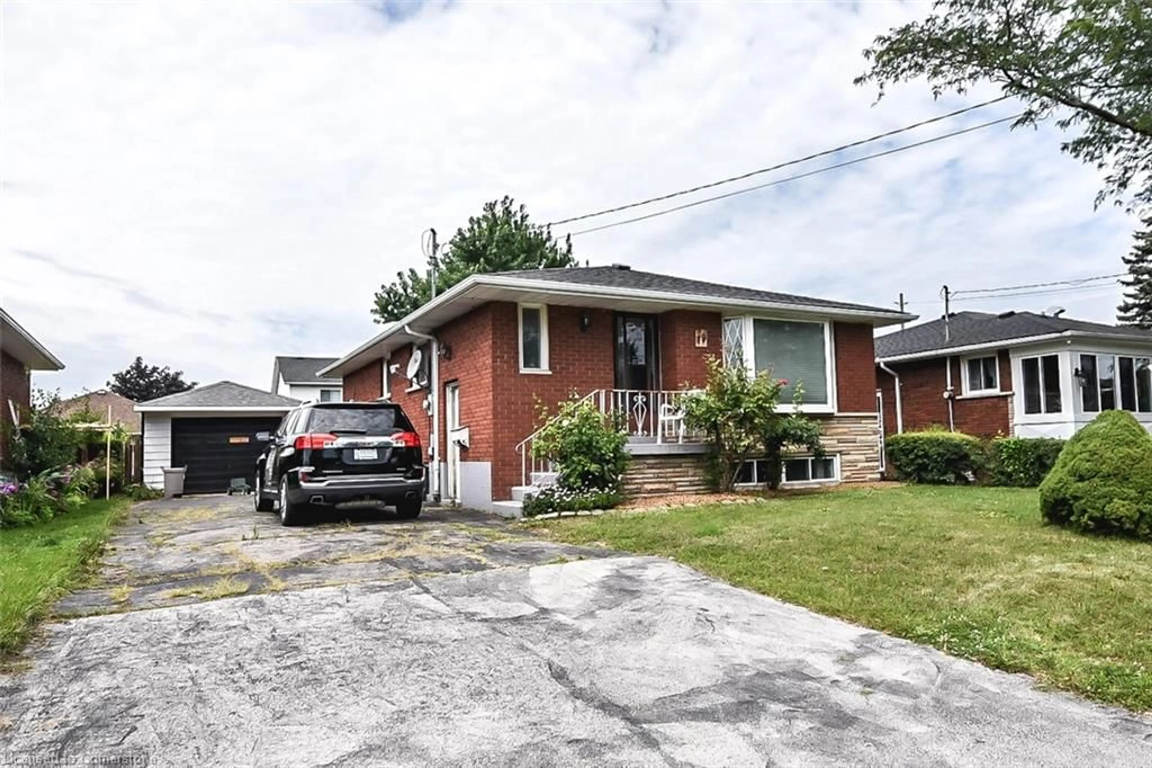 Home with brick exterior material, street for 79 Nash Rd, Hamilton Ontario L8H 2P5