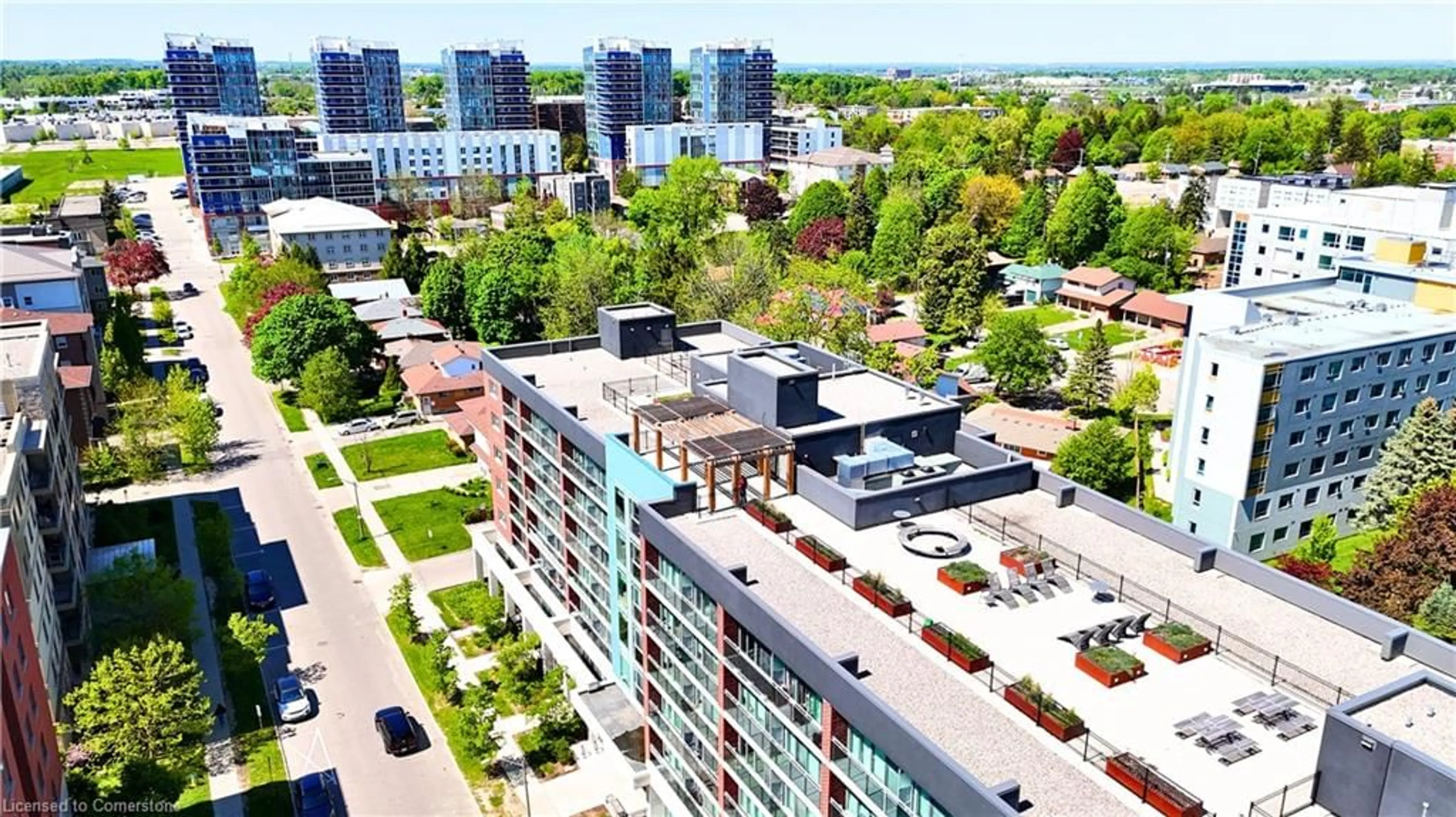 A pic from outside/outdoor area/front of a property/back of a property/a pic from drone, city buildings view from balcony for 308 Lester St #214, Waterloo Ontario N2L 3W6
