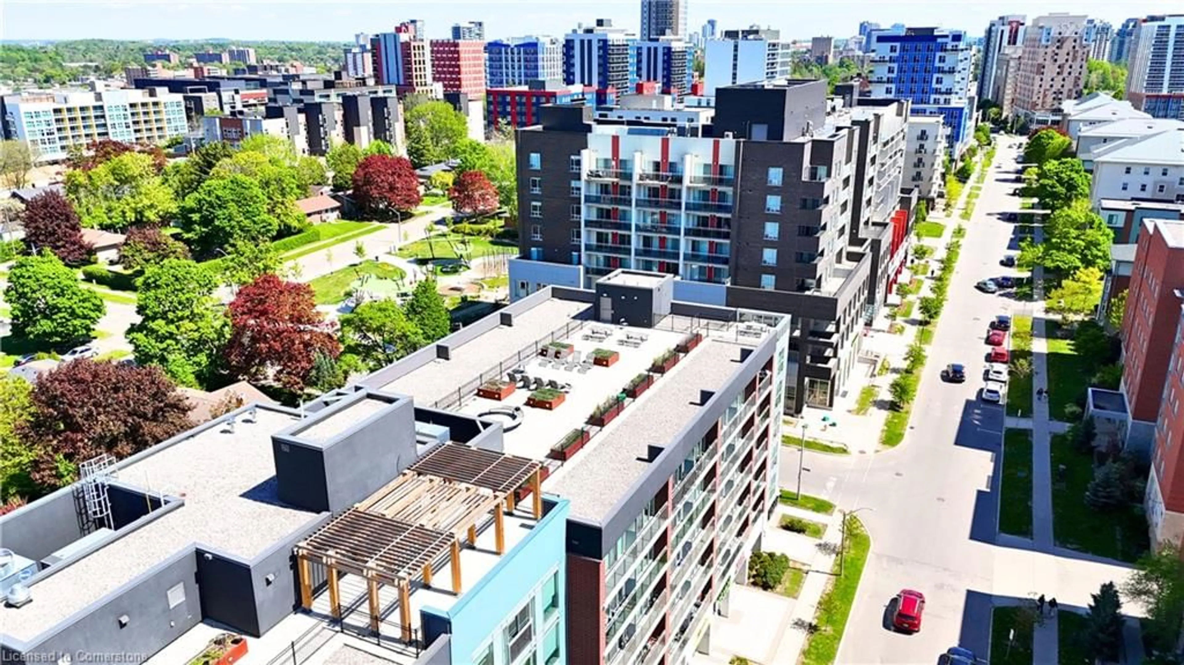 A pic from outside/outdoor area/front of a property/back of a property/a pic from drone, city buildings view from balcony for 308 Lester St #214, Waterloo Ontario N2L 3W6