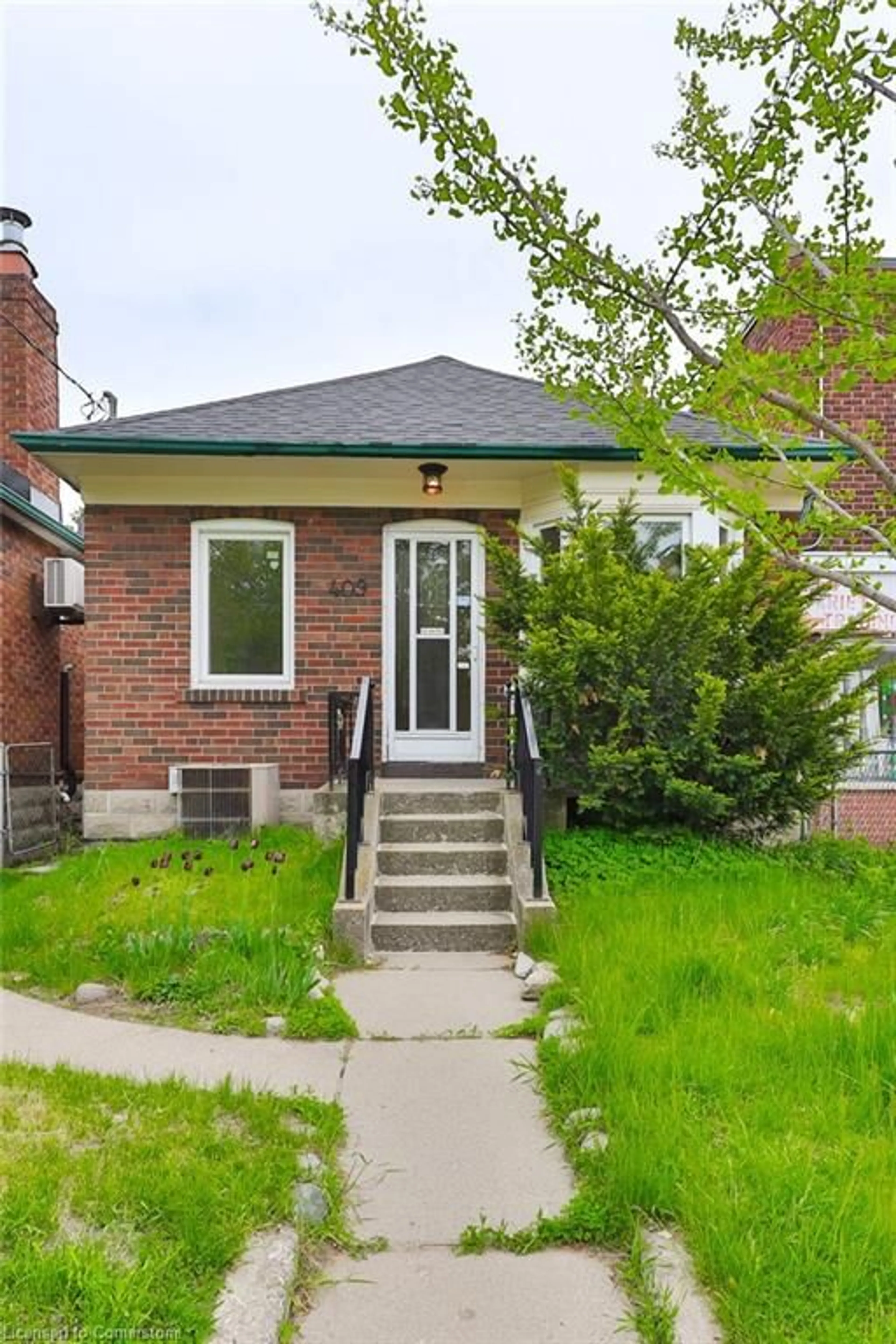 Home with brick exterior material, street for 409 Mortimer Ave, Toronto Ontario M4J 2E8