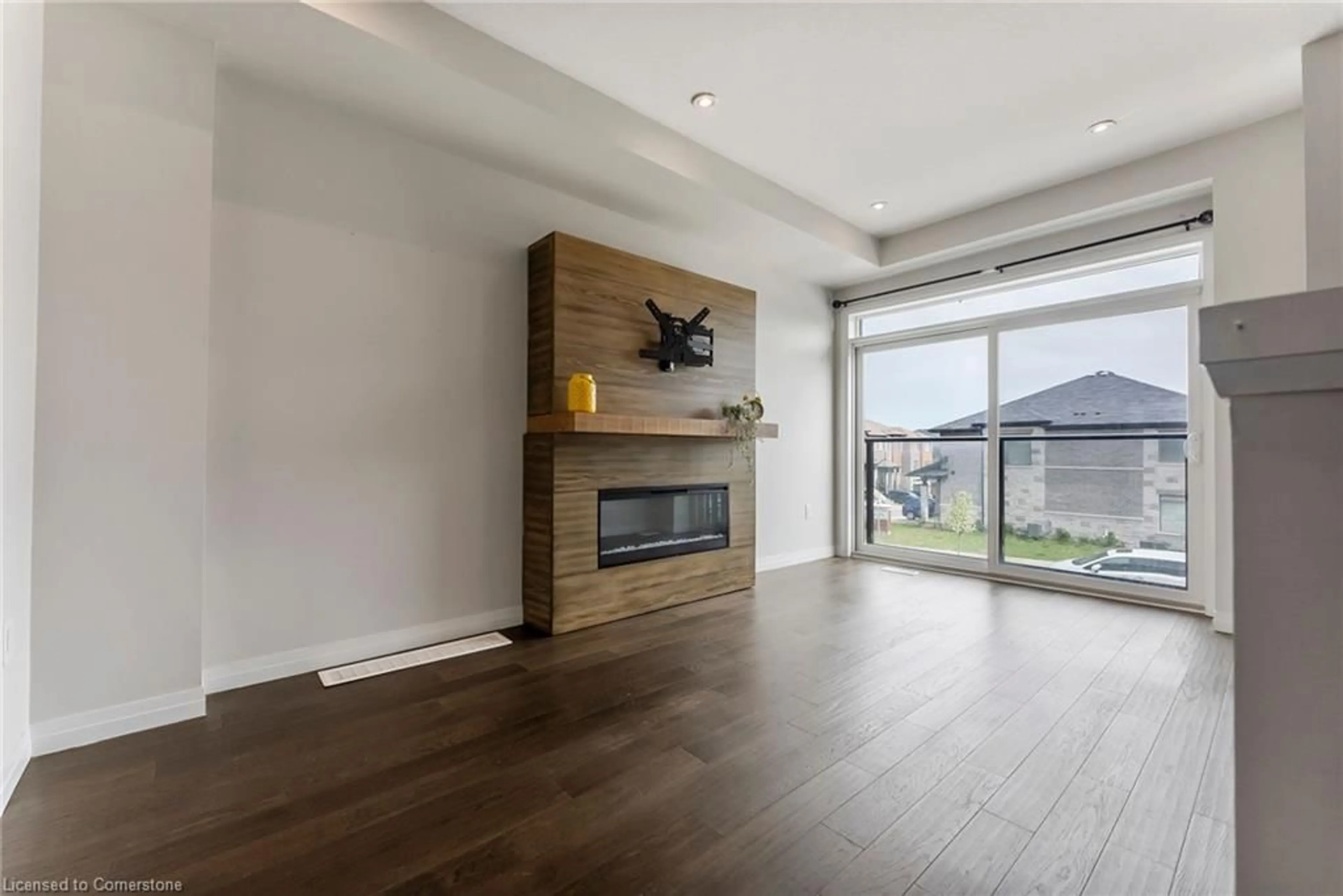 Living room with furniture, wood/laminate floor for 39 Soho St, Hamilton Ontario L8J 0L4
