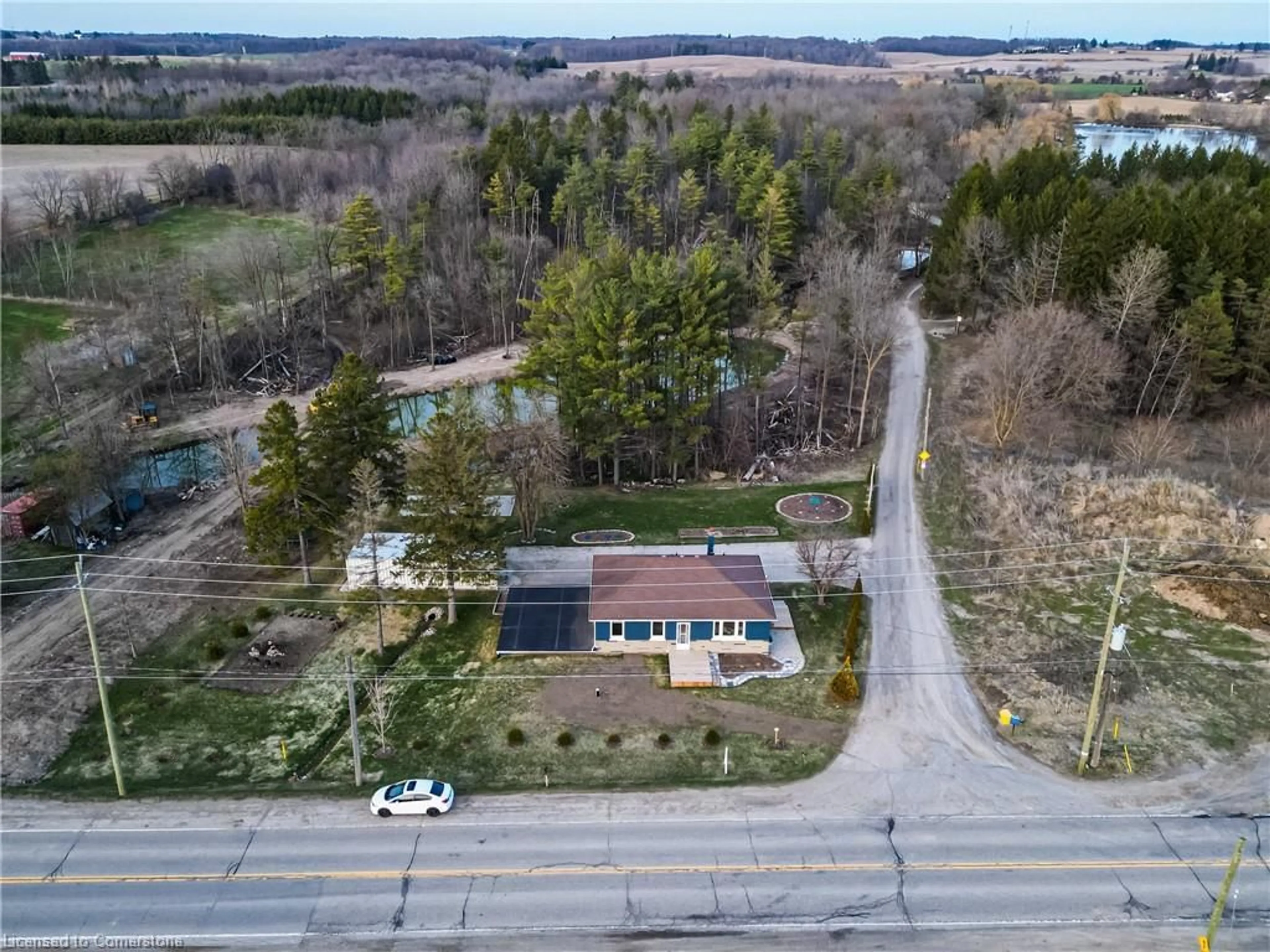 A pic from outside/outdoor area/front of a property/back of a property/a pic from drone, street for 1327 Queen St, New Dundee Ontario N0B 2E0