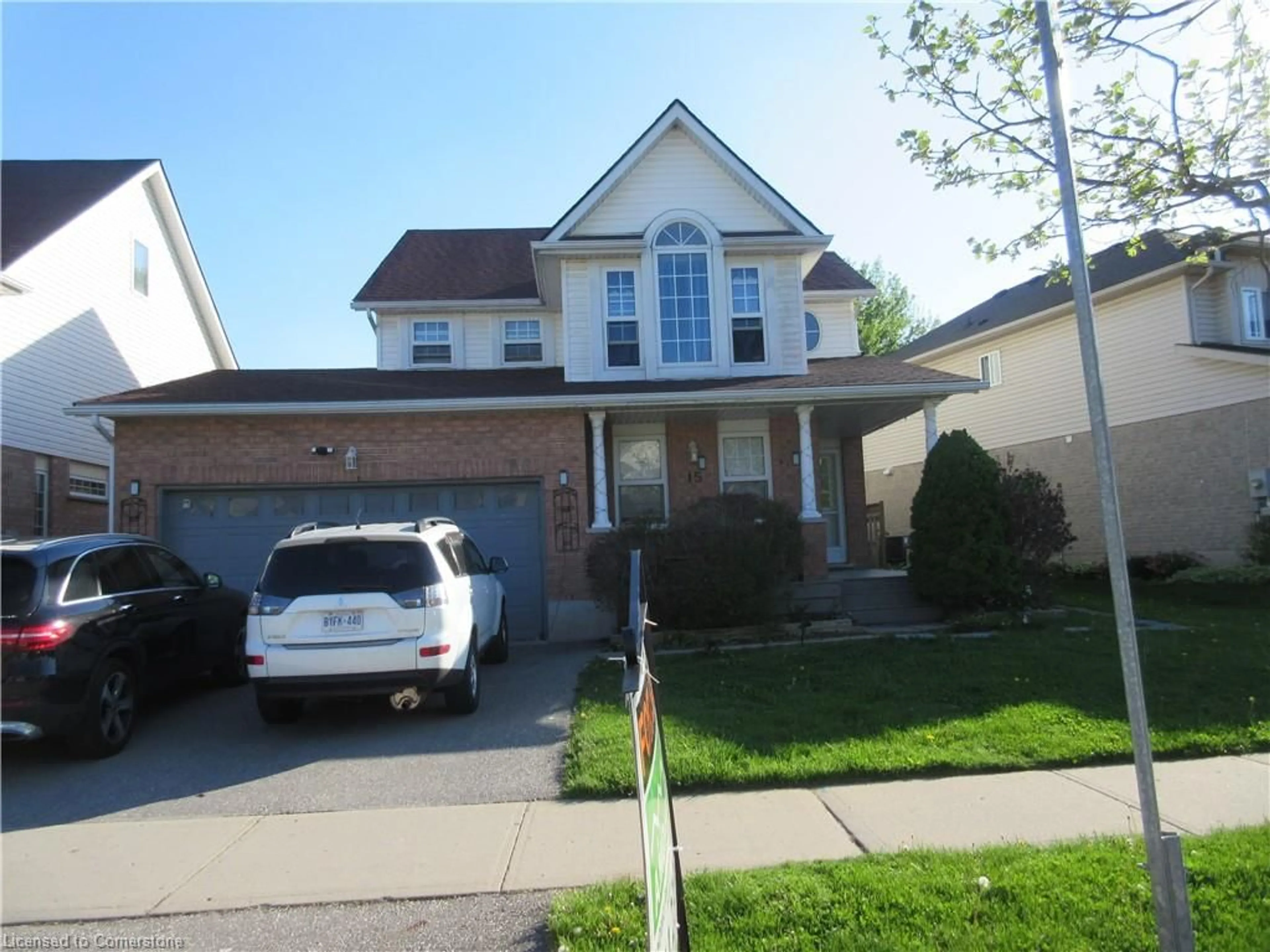 Home with vinyl exterior material, street for 15 Copper Leaf St, Kitchener Ontario N2E 3T3