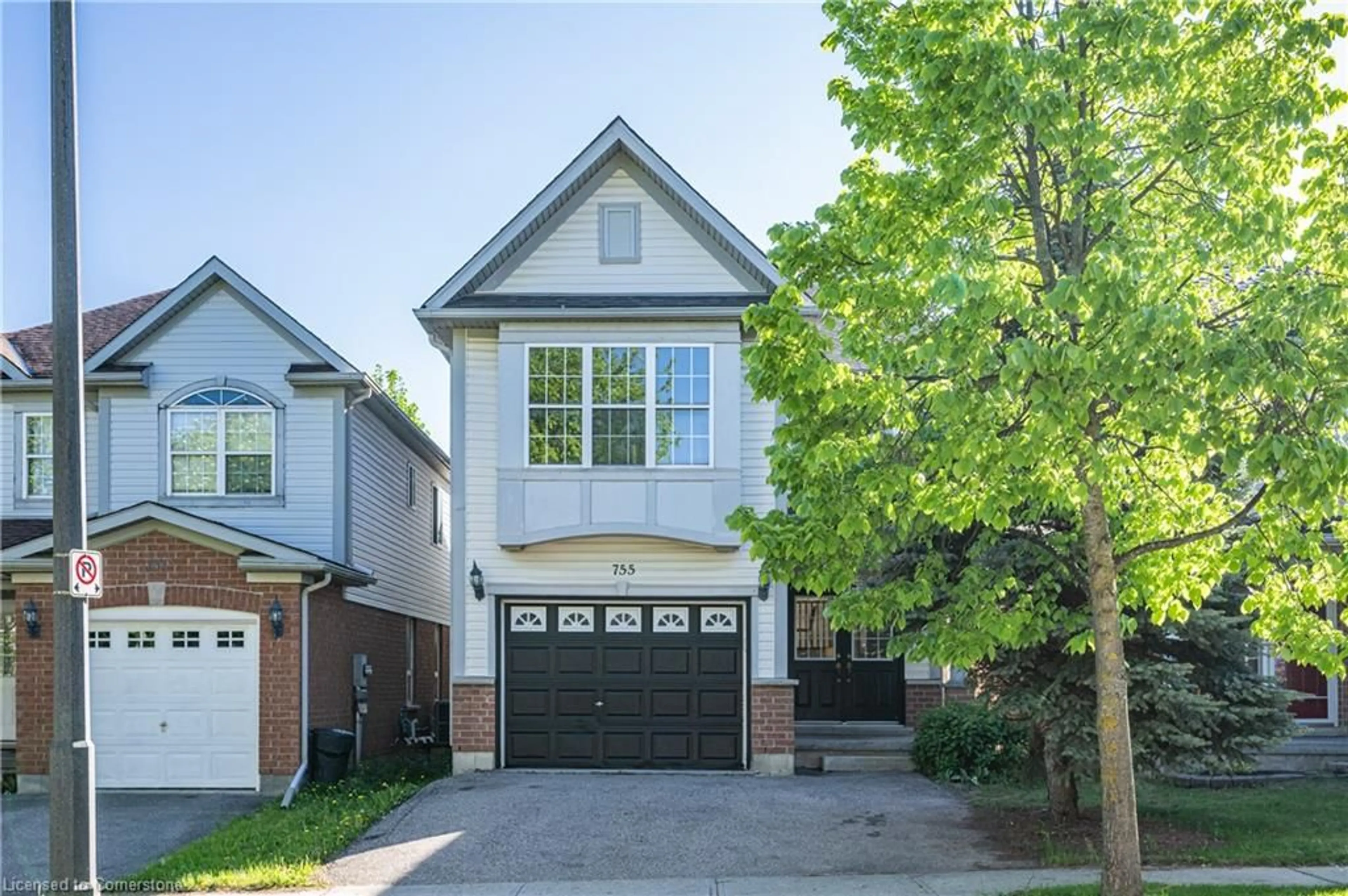 Home with brick exterior material, street for 755 Zermatt Dr, Waterloo Ontario N2T 2W8