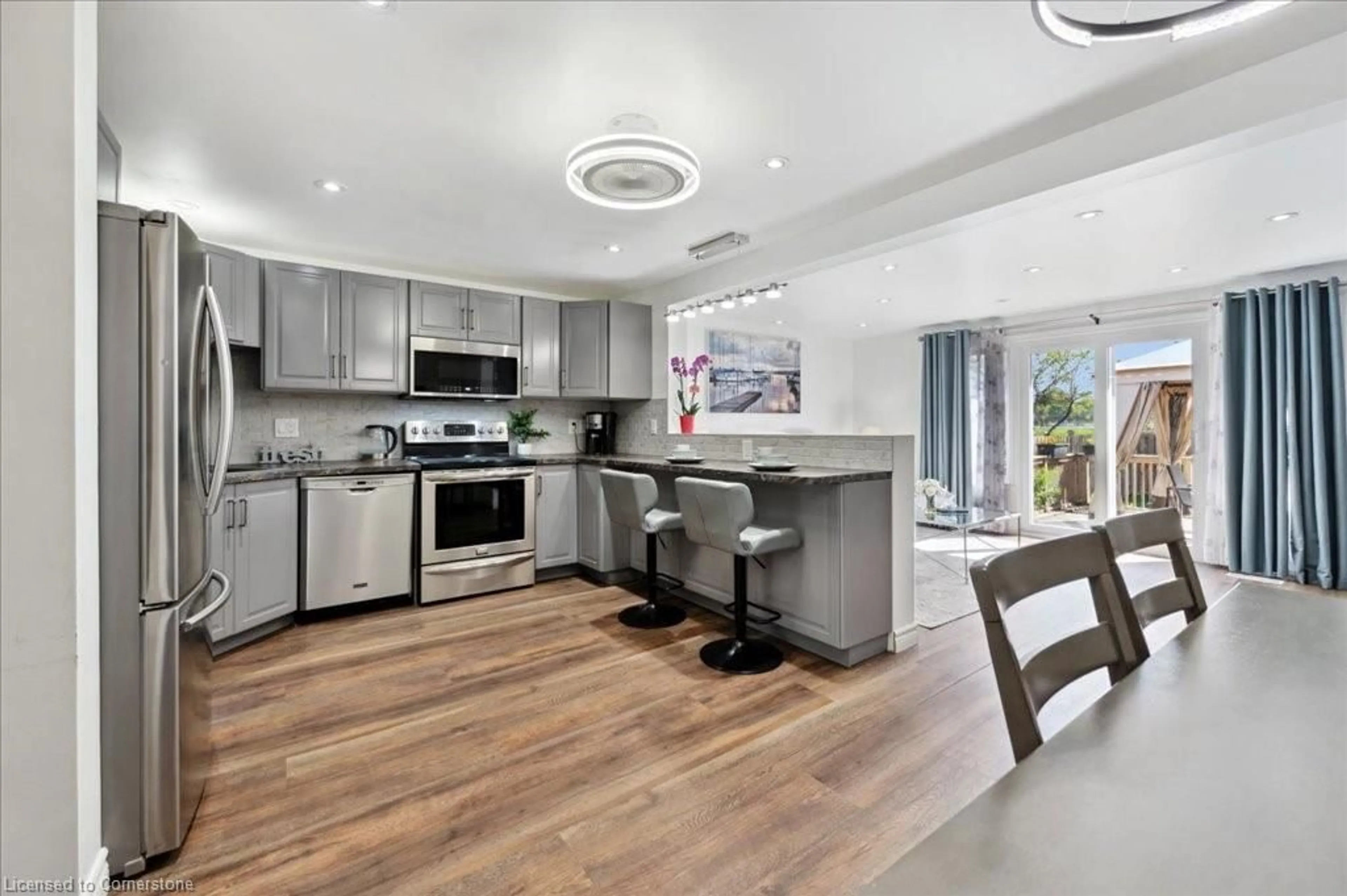 Open concept kitchen, unknown for 11 Candlewood Dr, Guelph Ontario N1K 1W2