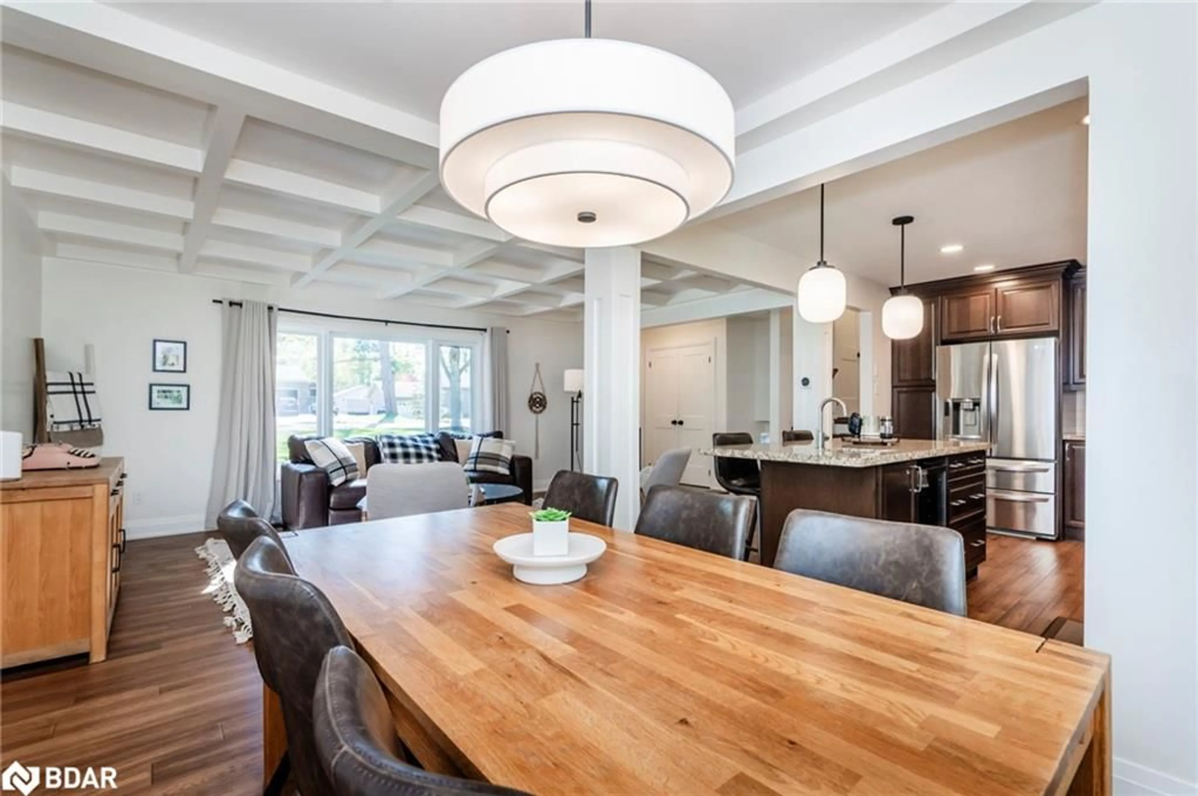 Open concept kitchen, wood/laminate floor for 1185 St Vincent St, Midhurst Ontario L9X 0R2