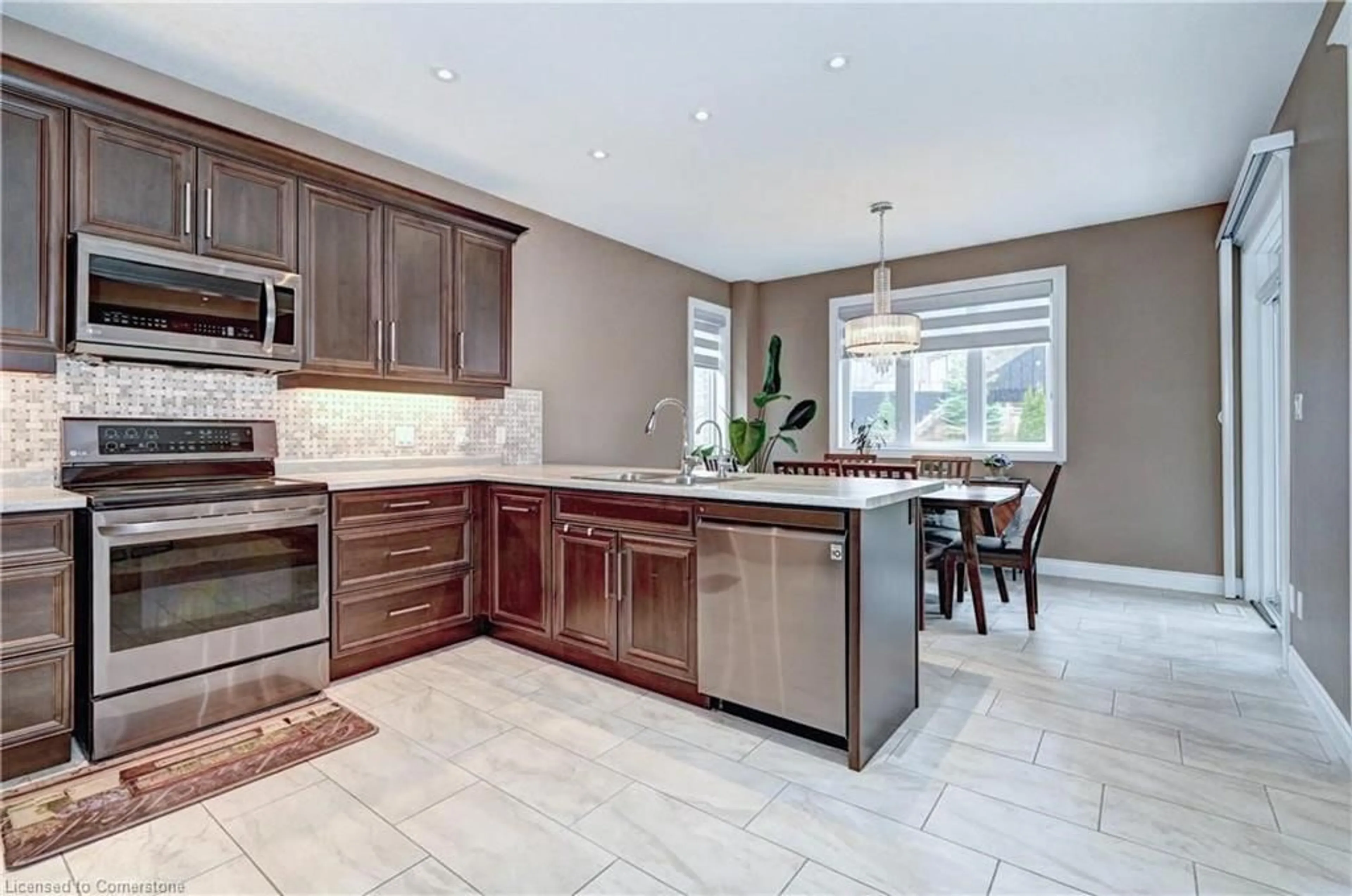 Open concept kitchen, ceramic/tile floor for 220 Ladyslipper Dr, Waterloo Ontario N2V 0E2