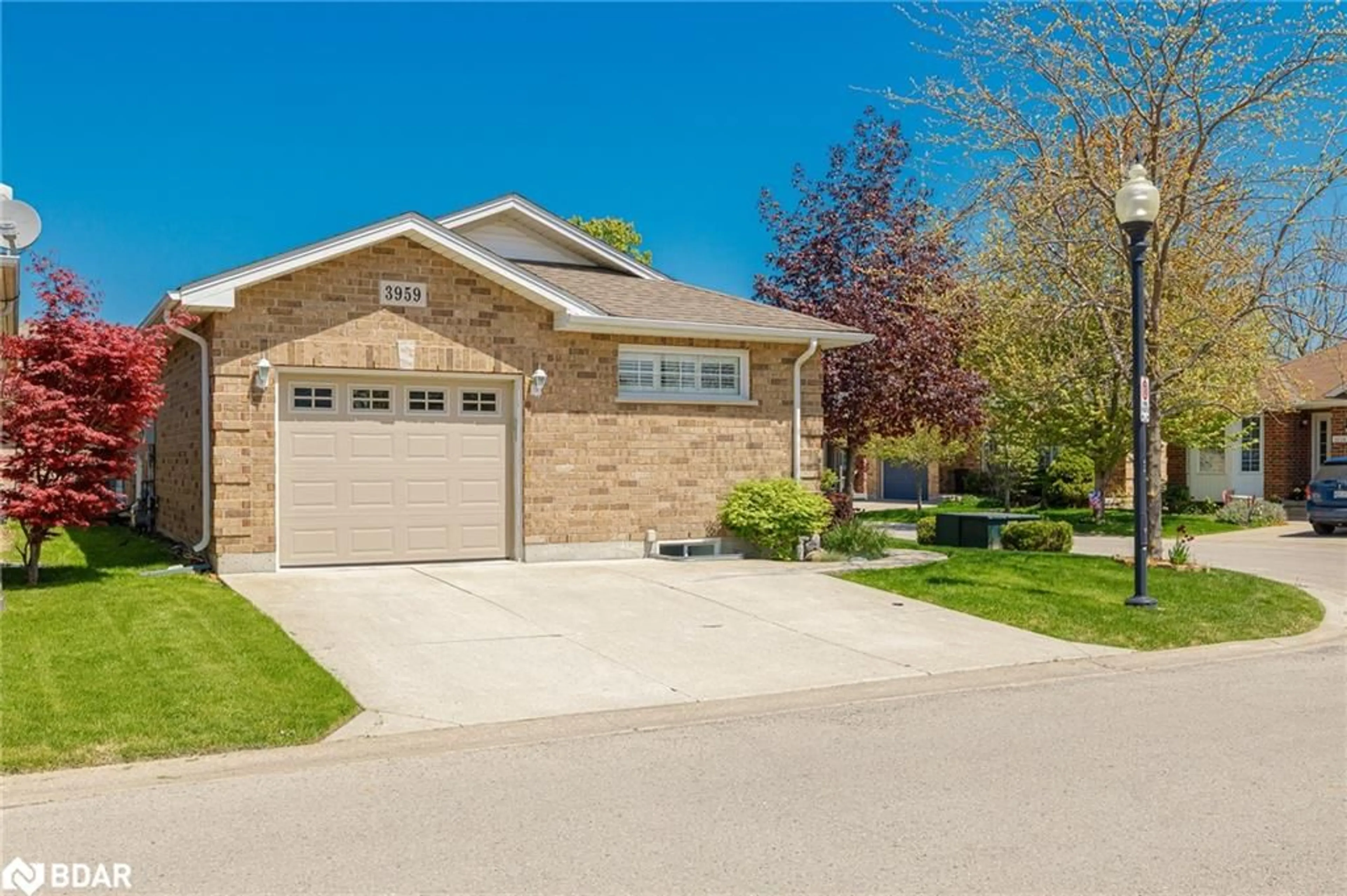 Home with brick exterior material, street for 3959 Durban Lane, Vineland Ontario L0R 2C0