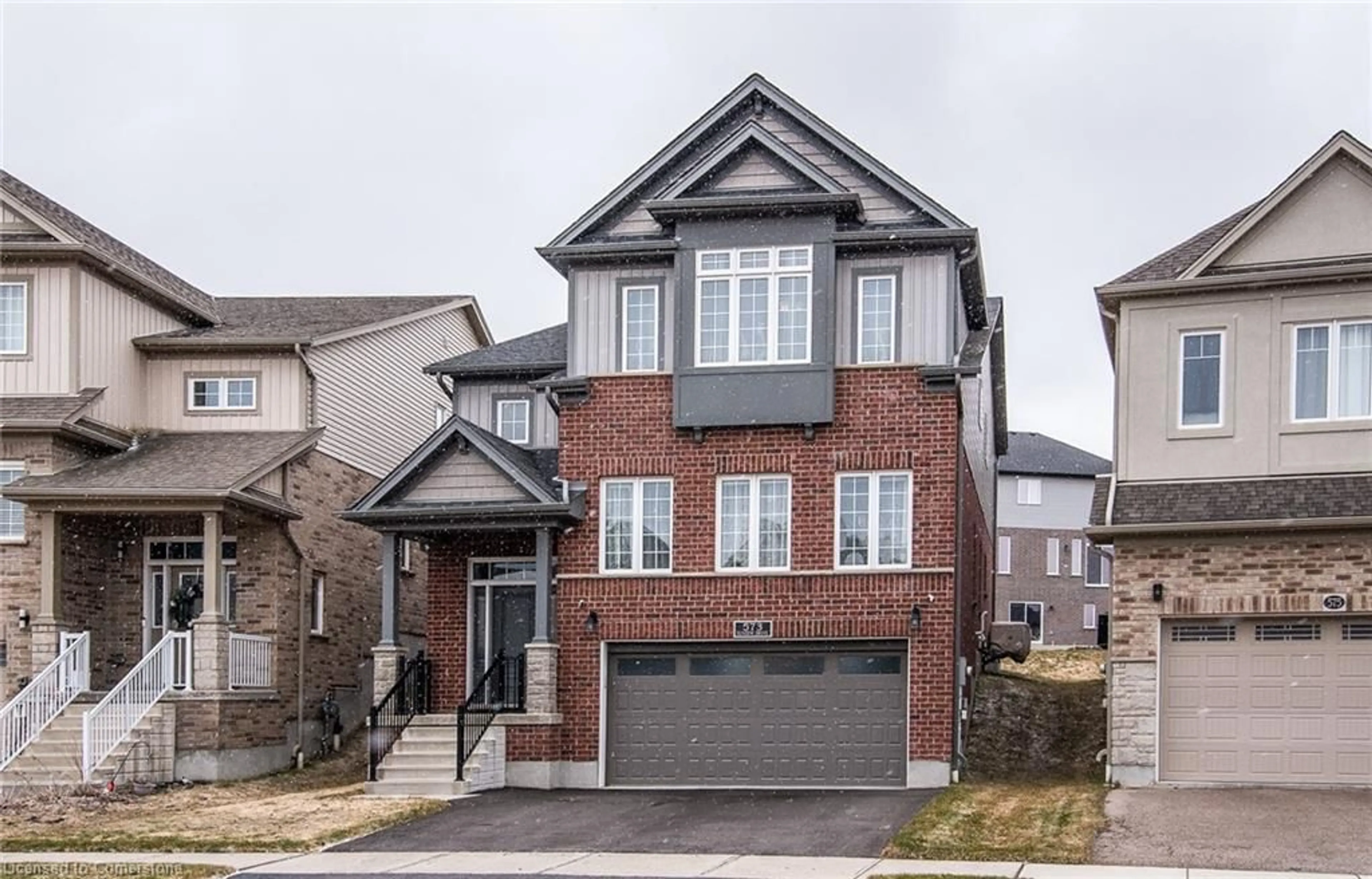 Home with brick exterior material, street for 573 Sundew Dr, Waterloo Ontario N2V 0B9