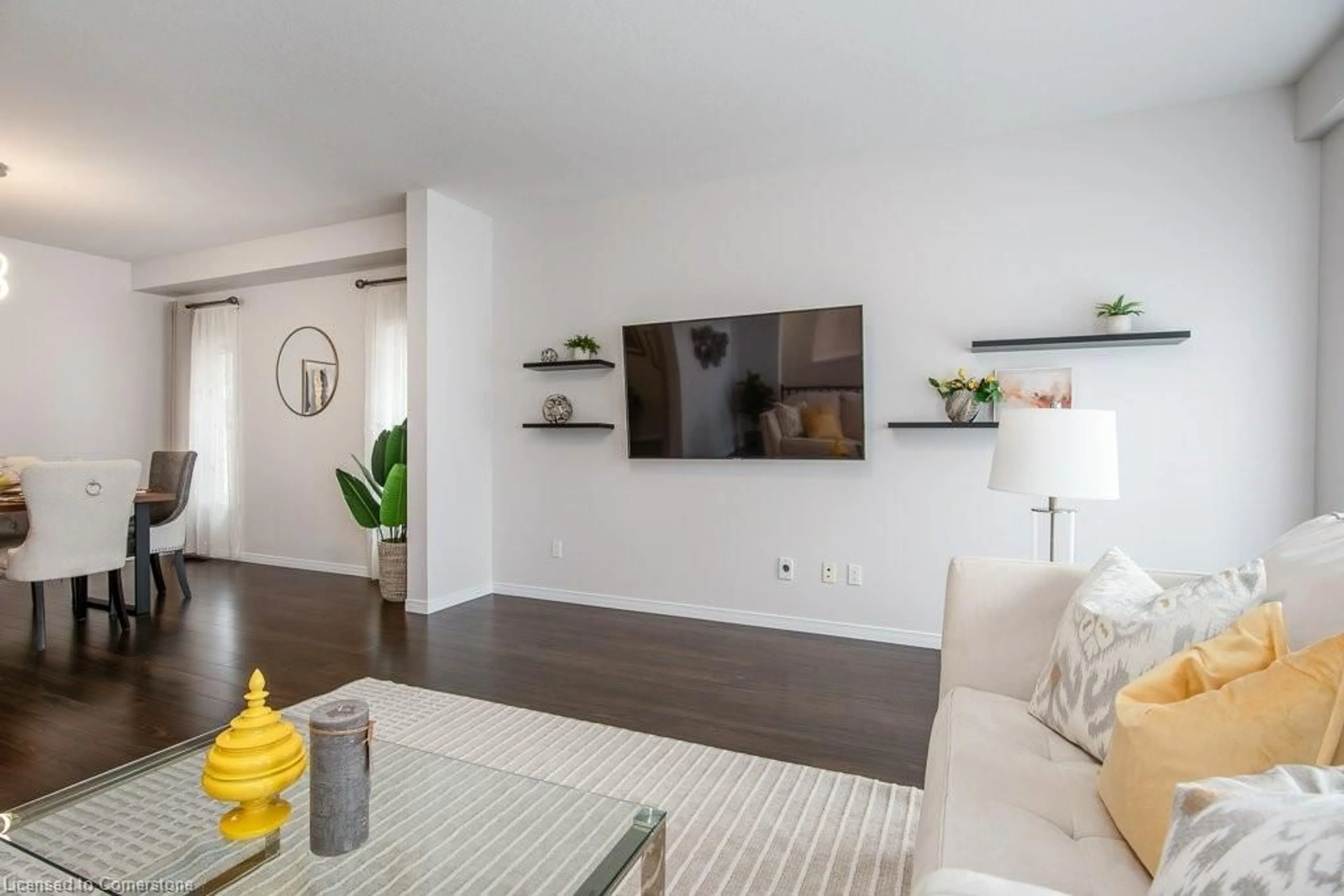 Living room with furniture, wood/laminate floor for 573 Sundew Dr, Waterloo Ontario N2V 0B9