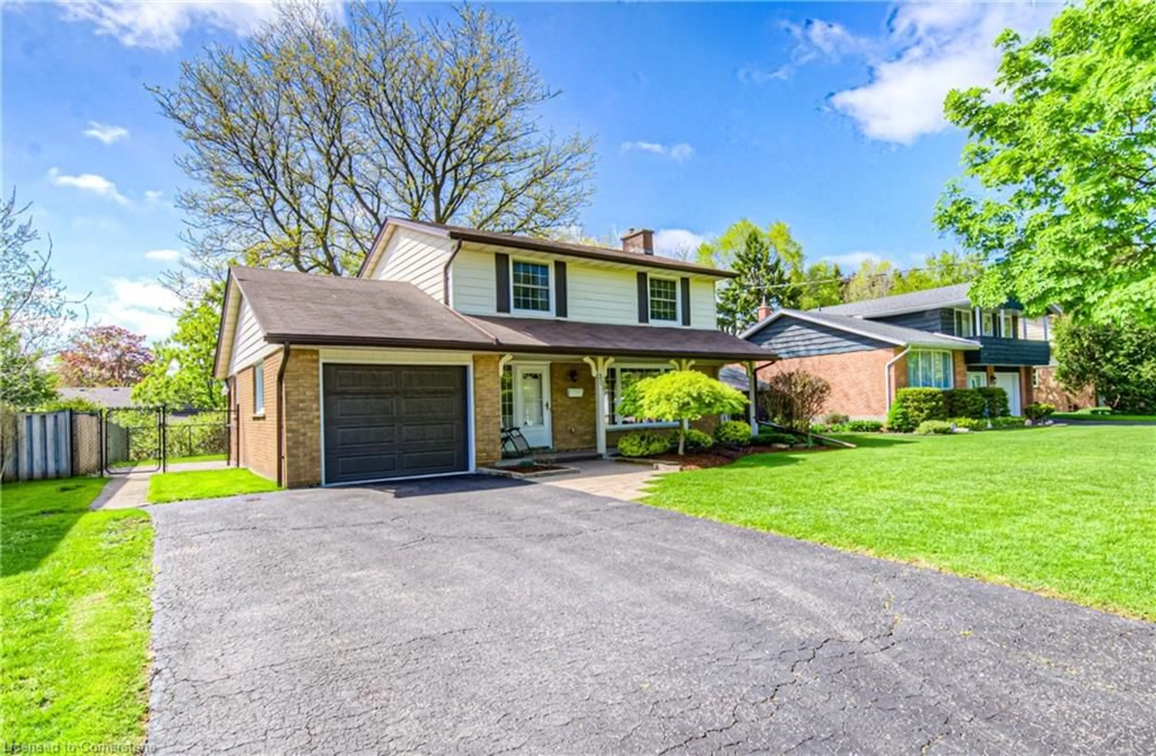 Home with vinyl exterior material, street for 301 Greenbrook Dr, Kitchener Ontario N2M 4K1