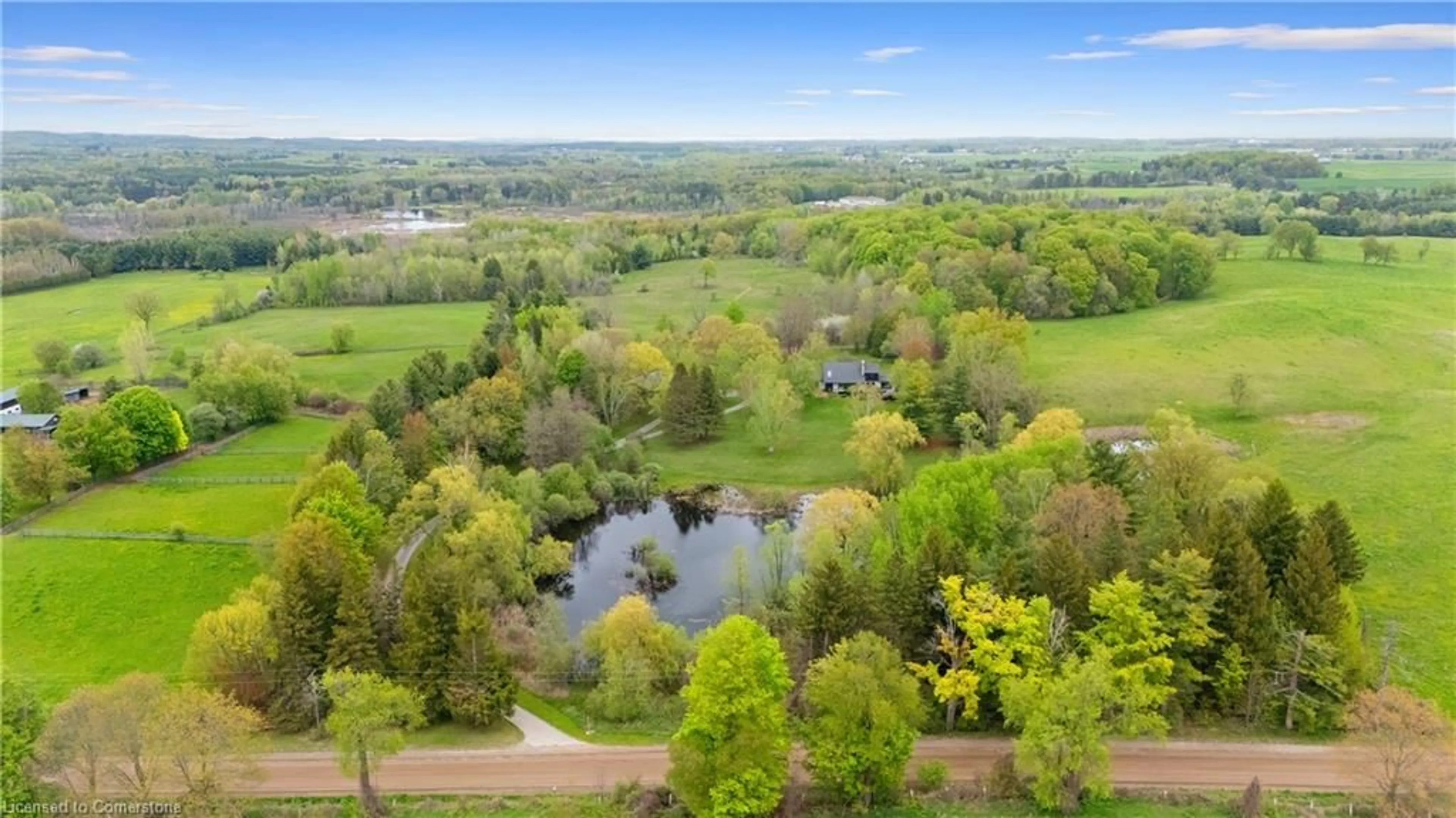 A pic from outside/outdoor area/front of a property/back of a property/a pic from drone, water/lake/river/ocean view for 15633 Kennedy Rd, Caledon Ontario L7C 2H7