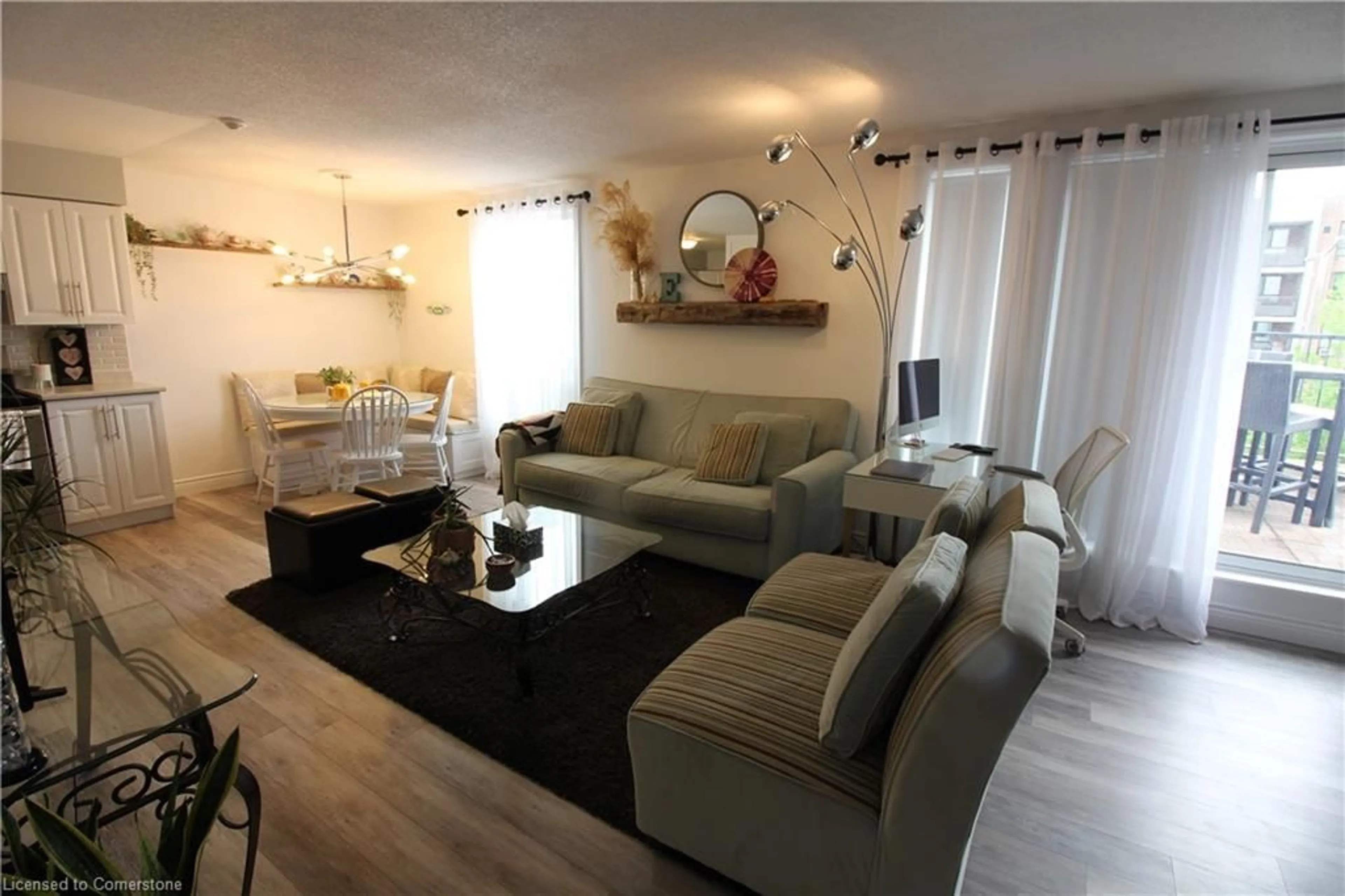 Living room with furniture, wood/laminate floor for 400 York Blvd, Hamilton Ontario L8R 3M5