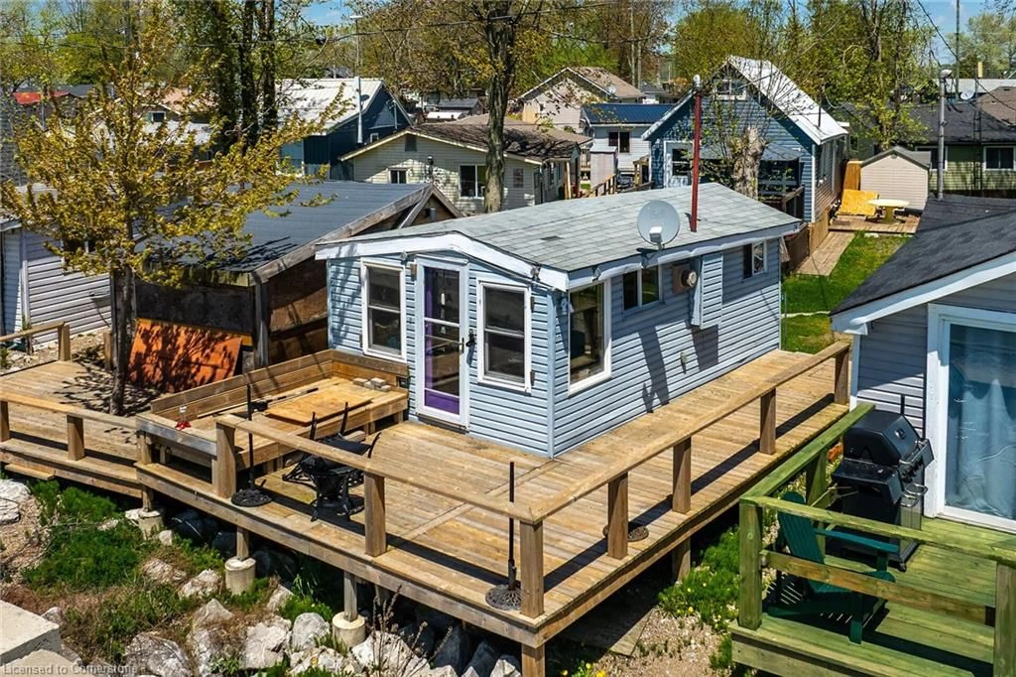 A pic from outside/outdoor area/front of a property/back of a property/a pic from drone, water/lake/river/ocean view for 24 Heather Lane, Featherstone Point Ontario N0A 1P0
