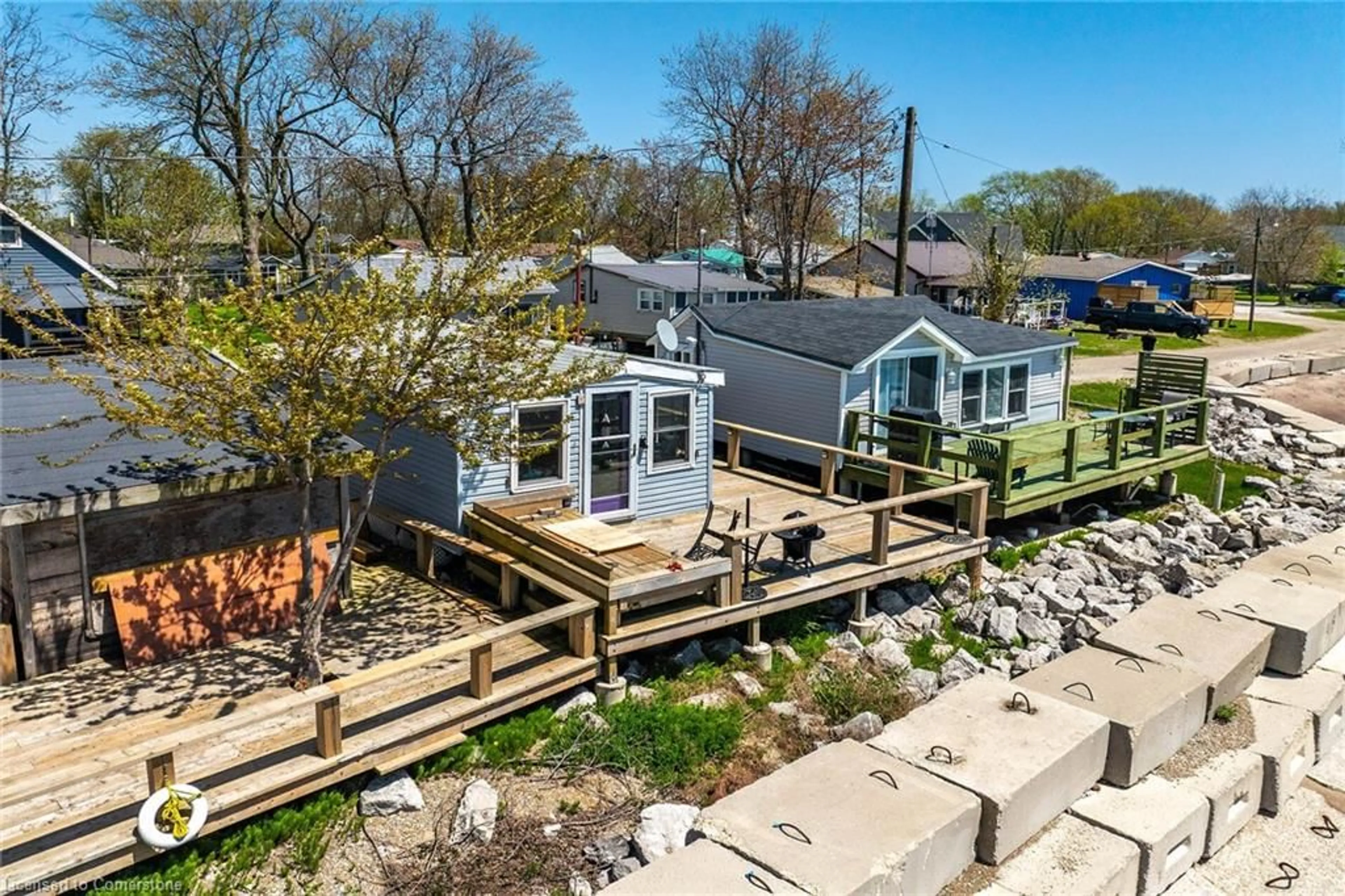 A pic from outside/outdoor area/front of a property/back of a property/a pic from drone, water/lake/river/ocean view for 24 Heather Lane, Featherstone Point Ontario N0A 1P0